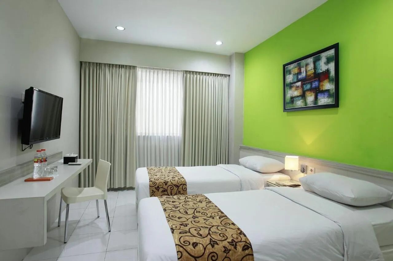 Bed in Rivisha Hotel