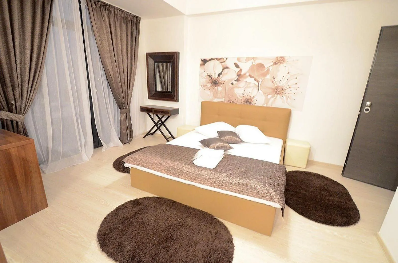 Bed in Uptown Residence Apartments