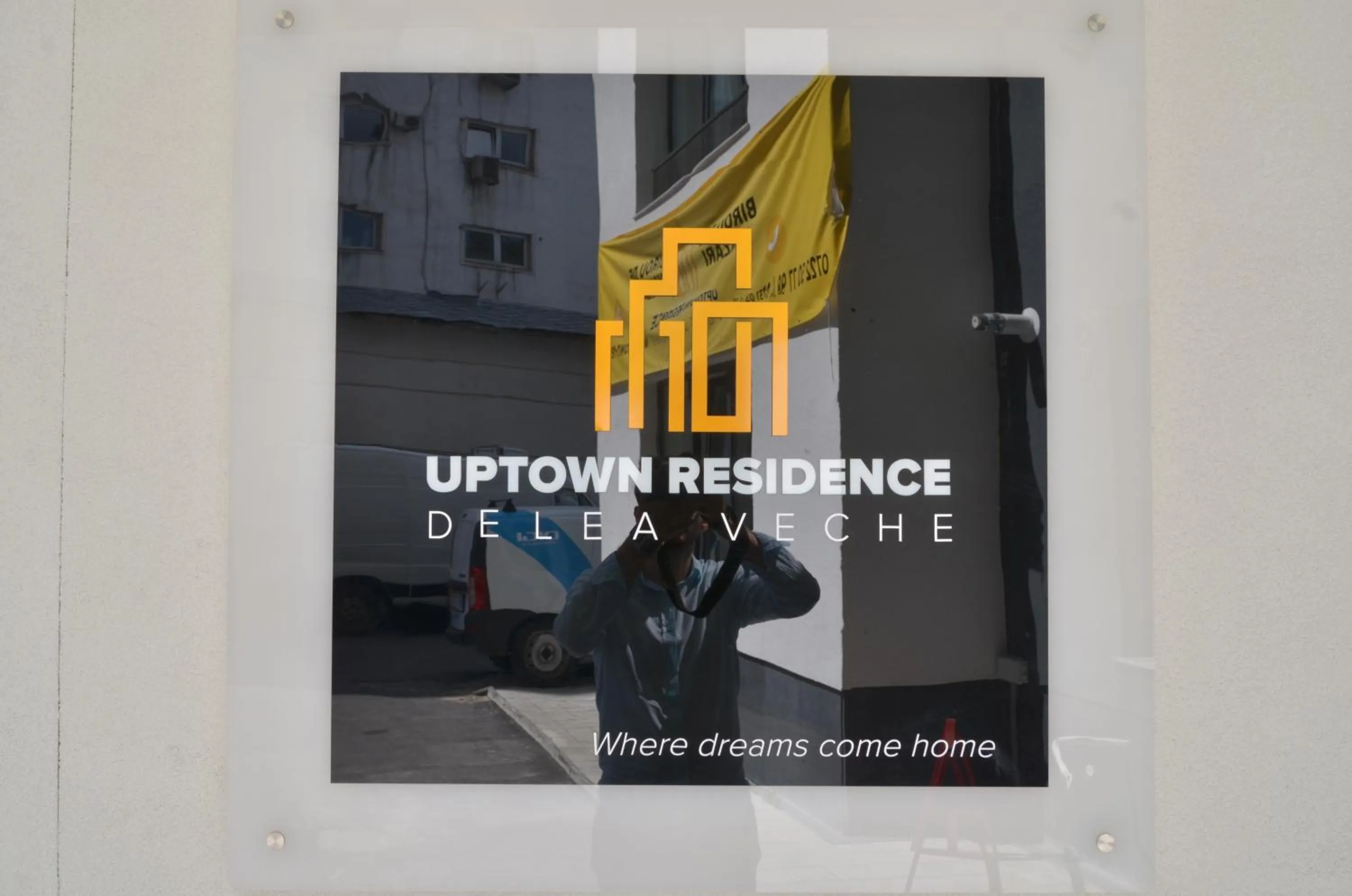 Property logo or sign in Uptown Residence Apartments