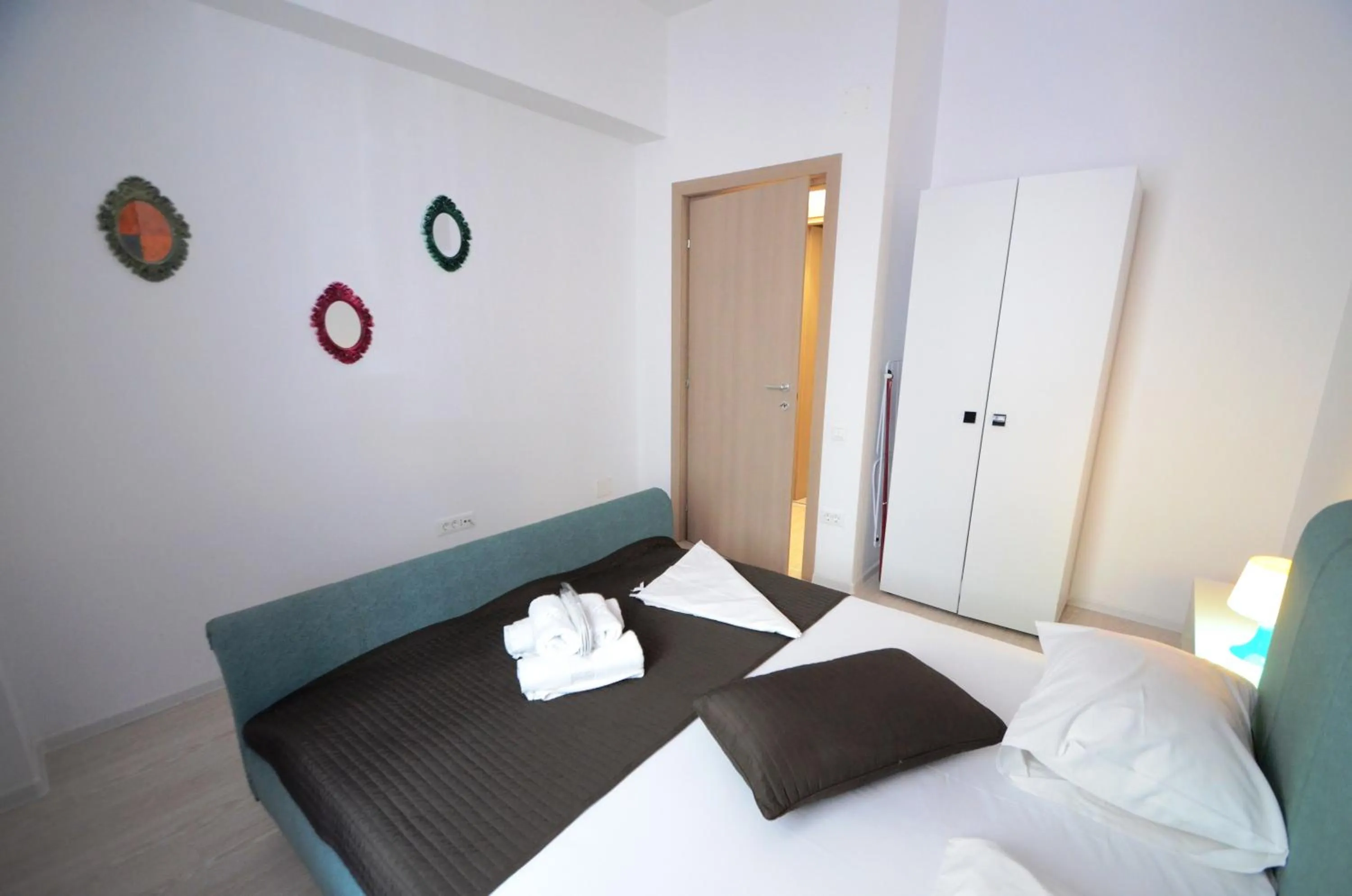 Decorative detail, Bed in Uptown Residence Apartments