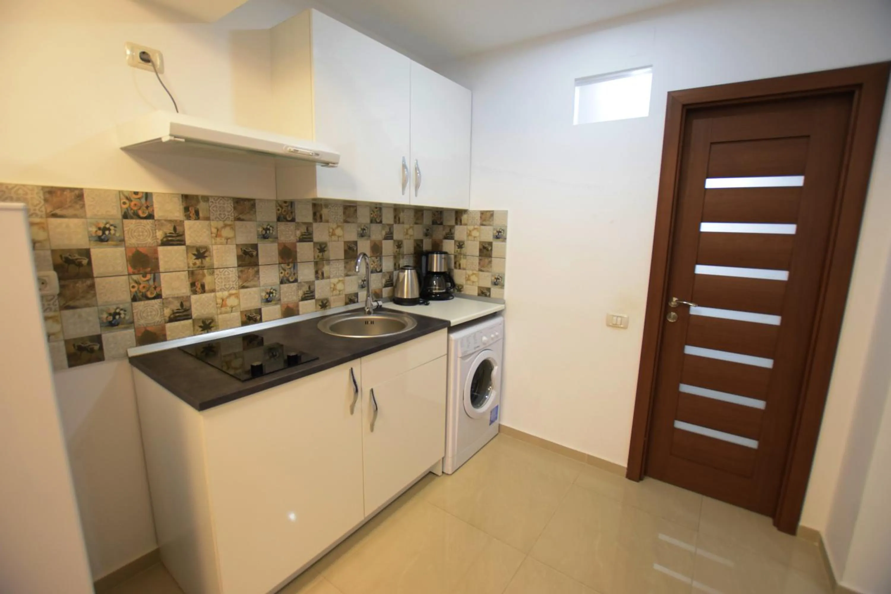Kitchen or kitchenette in Decebal Residence Apartments
