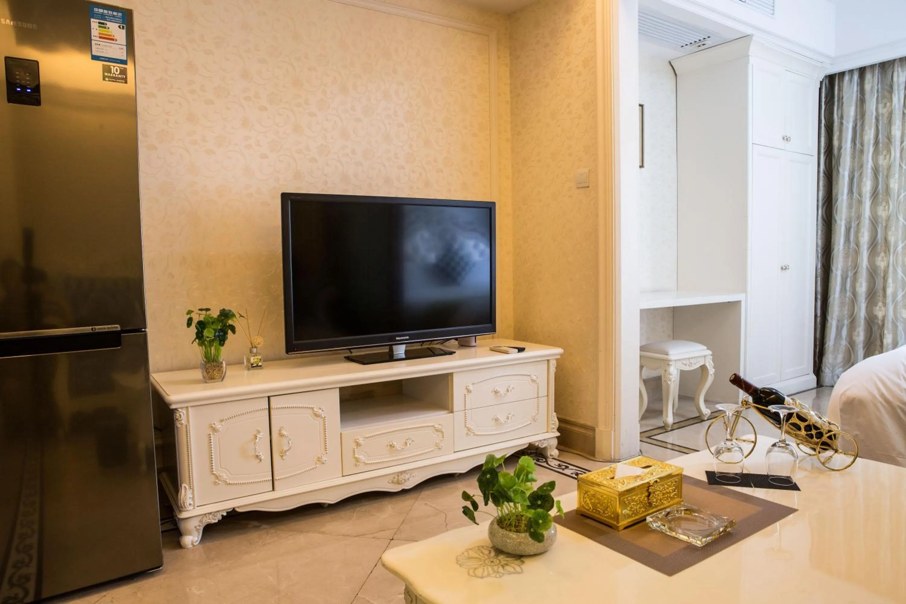 Bed in WAIFIDEN Guangzhou HaiZhu Square WanYi Apartment