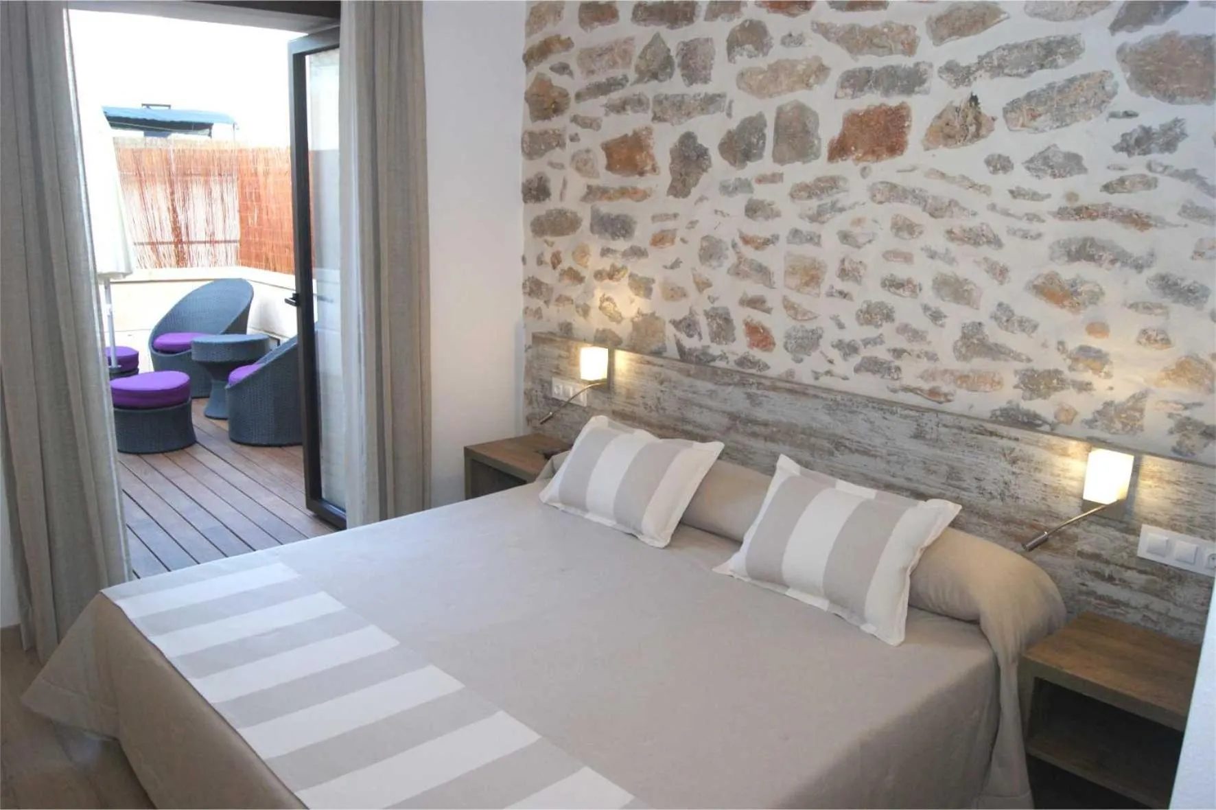 Bed in Petit Hotel C'an Mel