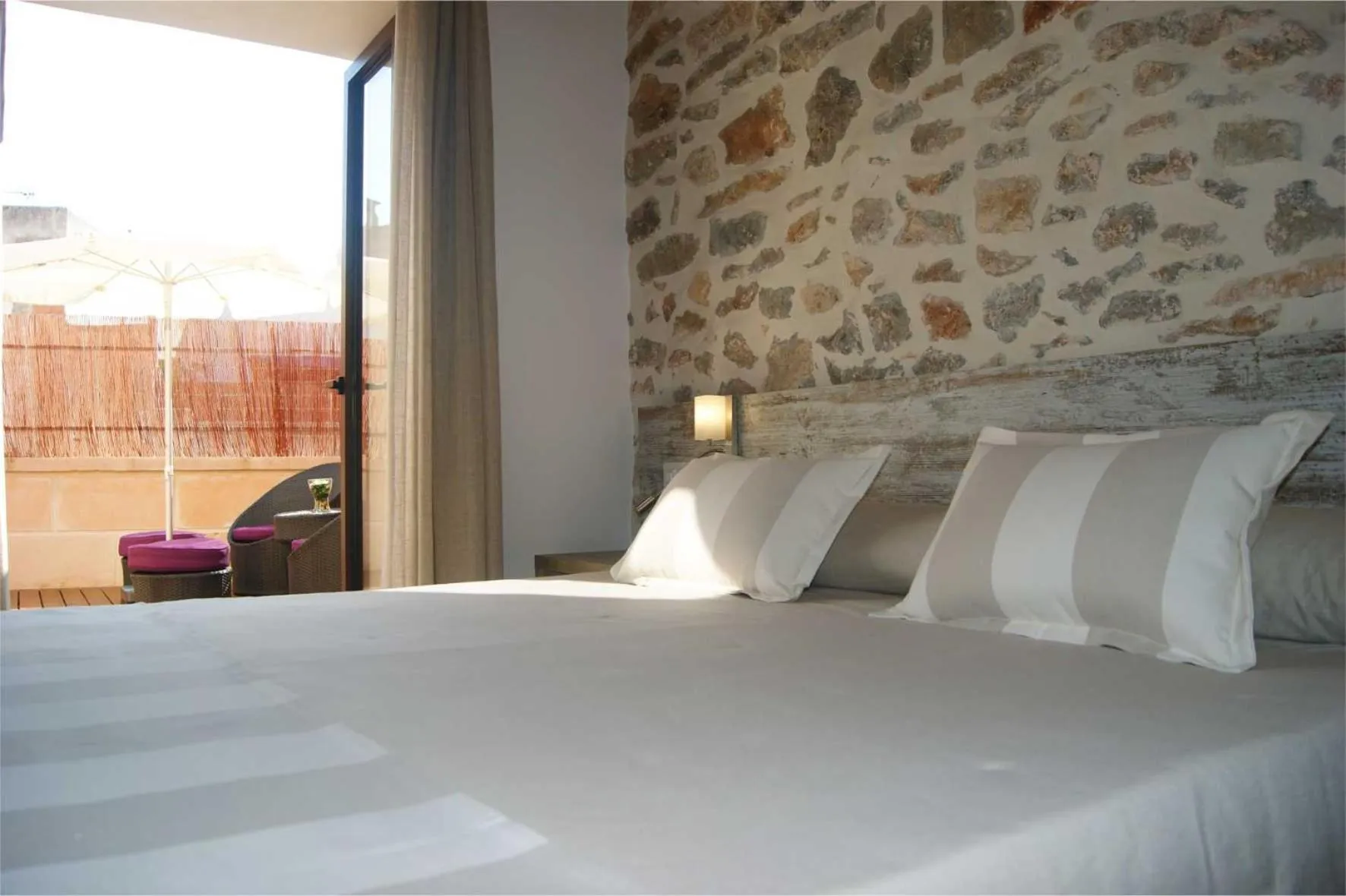 Bed in Petit Hotel C'an Mel