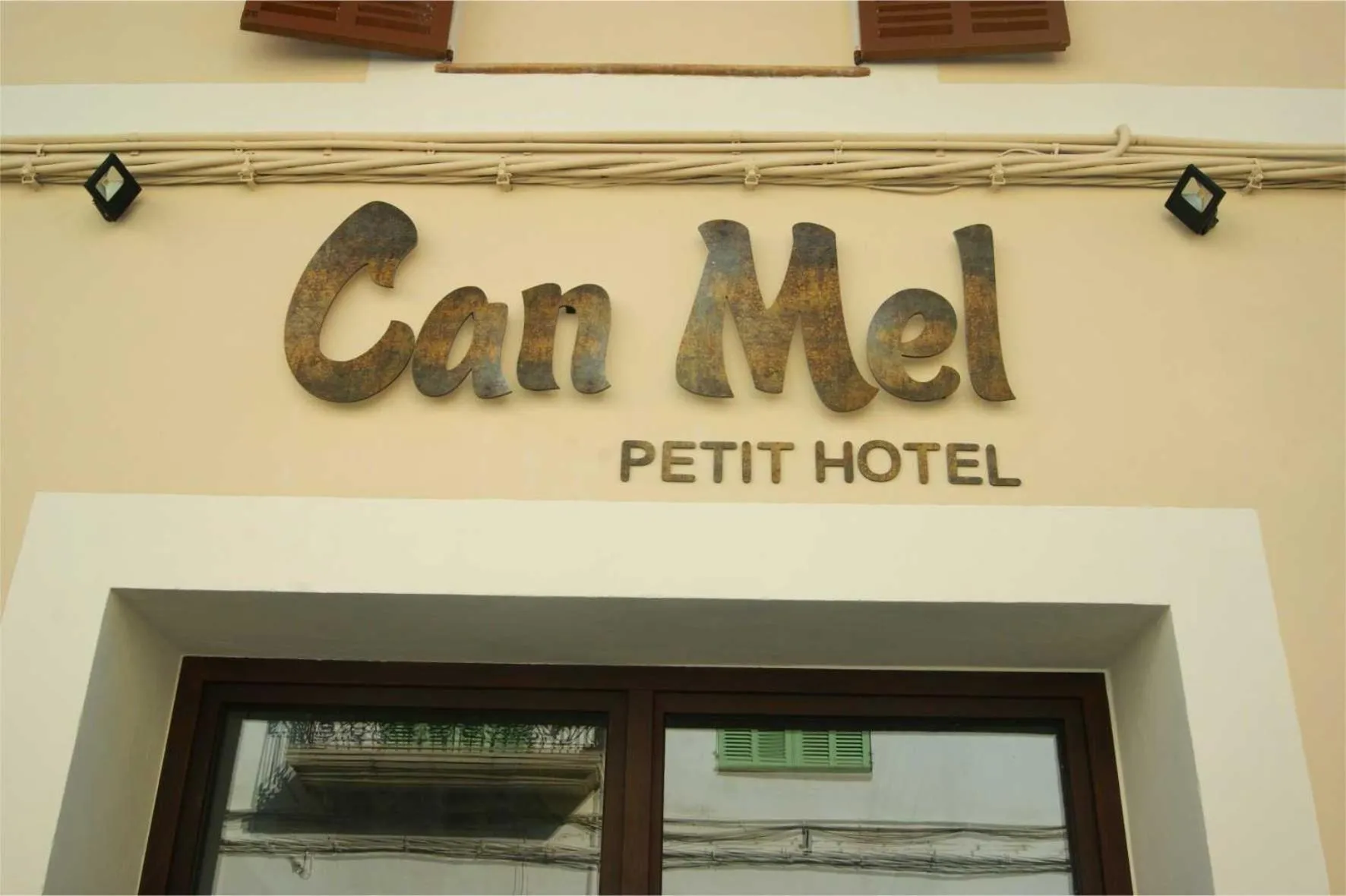 Property logo or sign in Petit Hotel C'an Mel