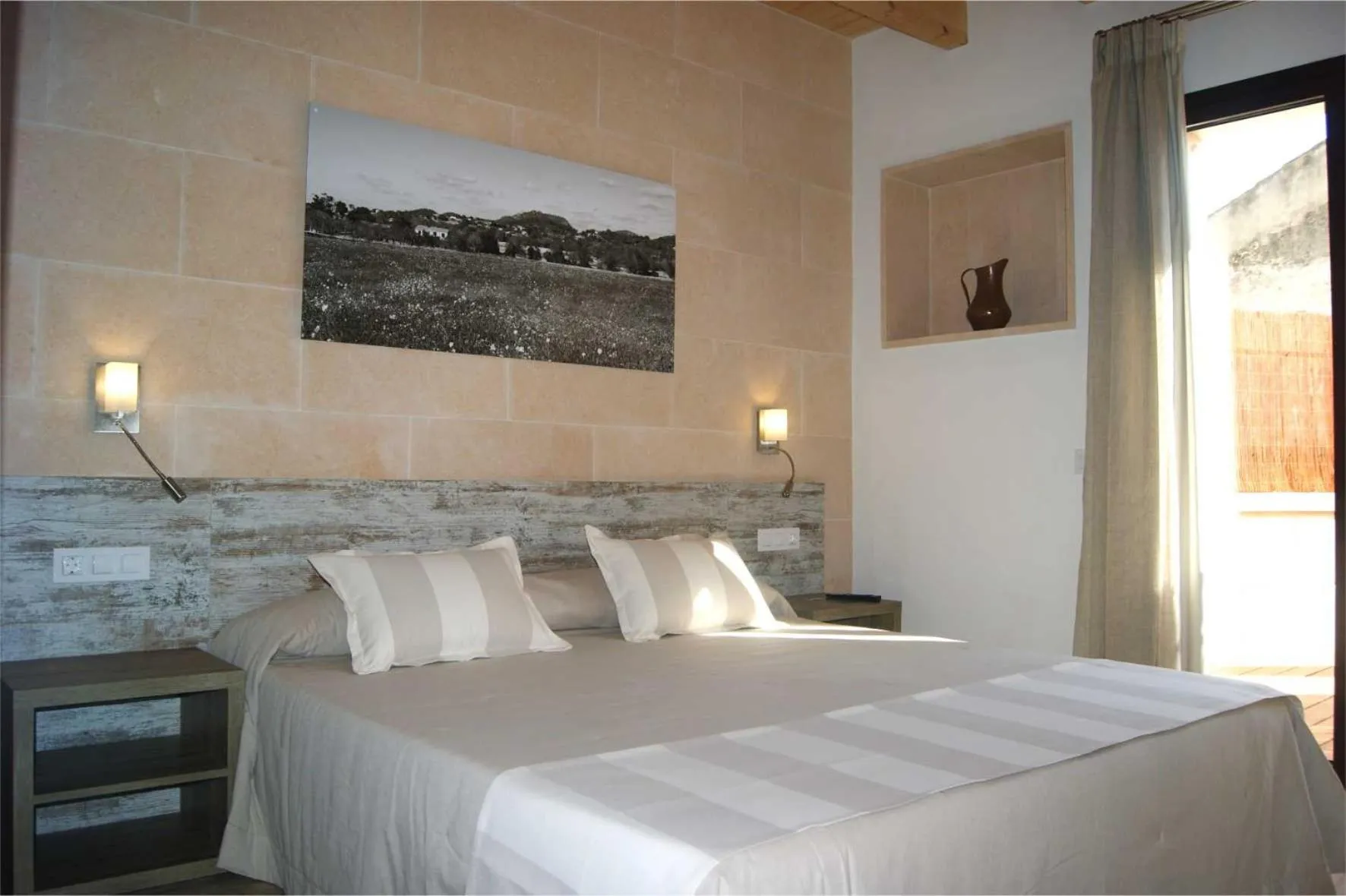 Bed in Petit Hotel C'an Mel