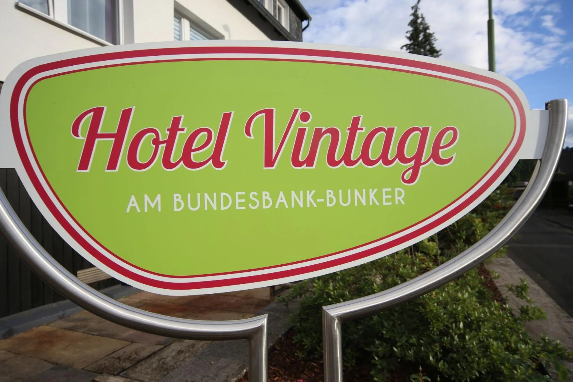 Property logo or sign in Hotel Vintage Am Bundesbank-Bunker