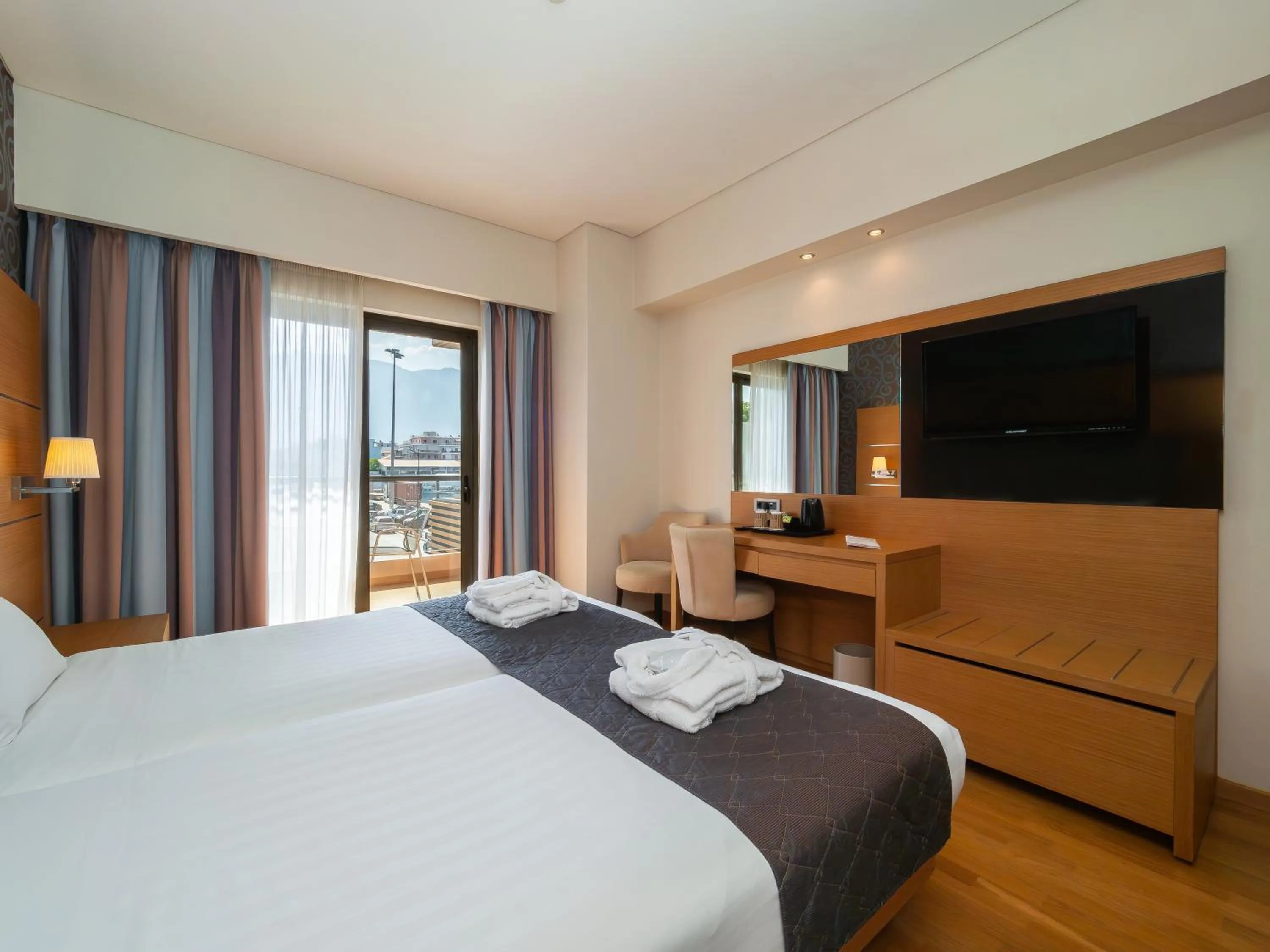 Bed in Elektra Hotel & Spa