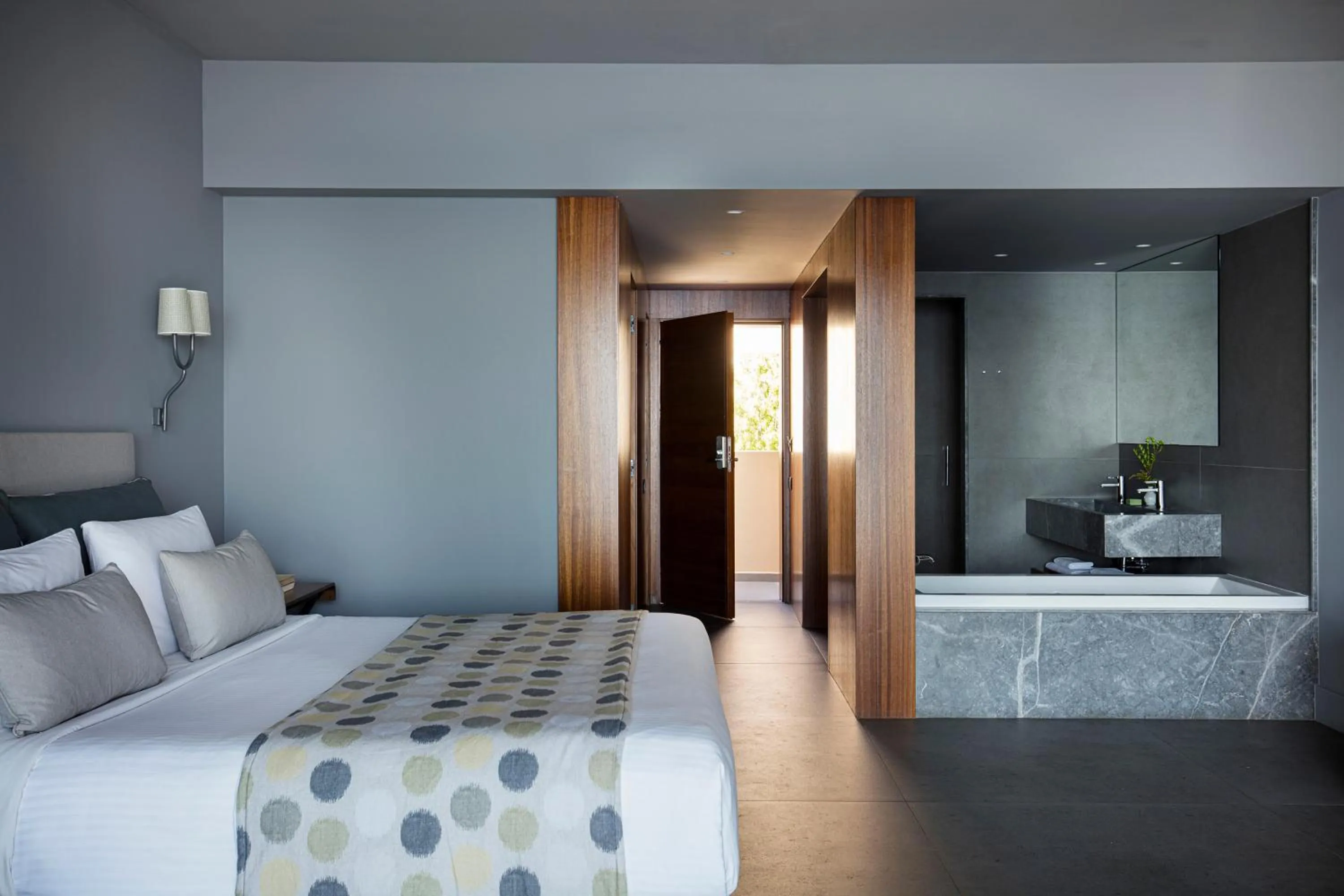 Bathroom, Bed in Aquila Elounda Village Resort, Suites & Spa