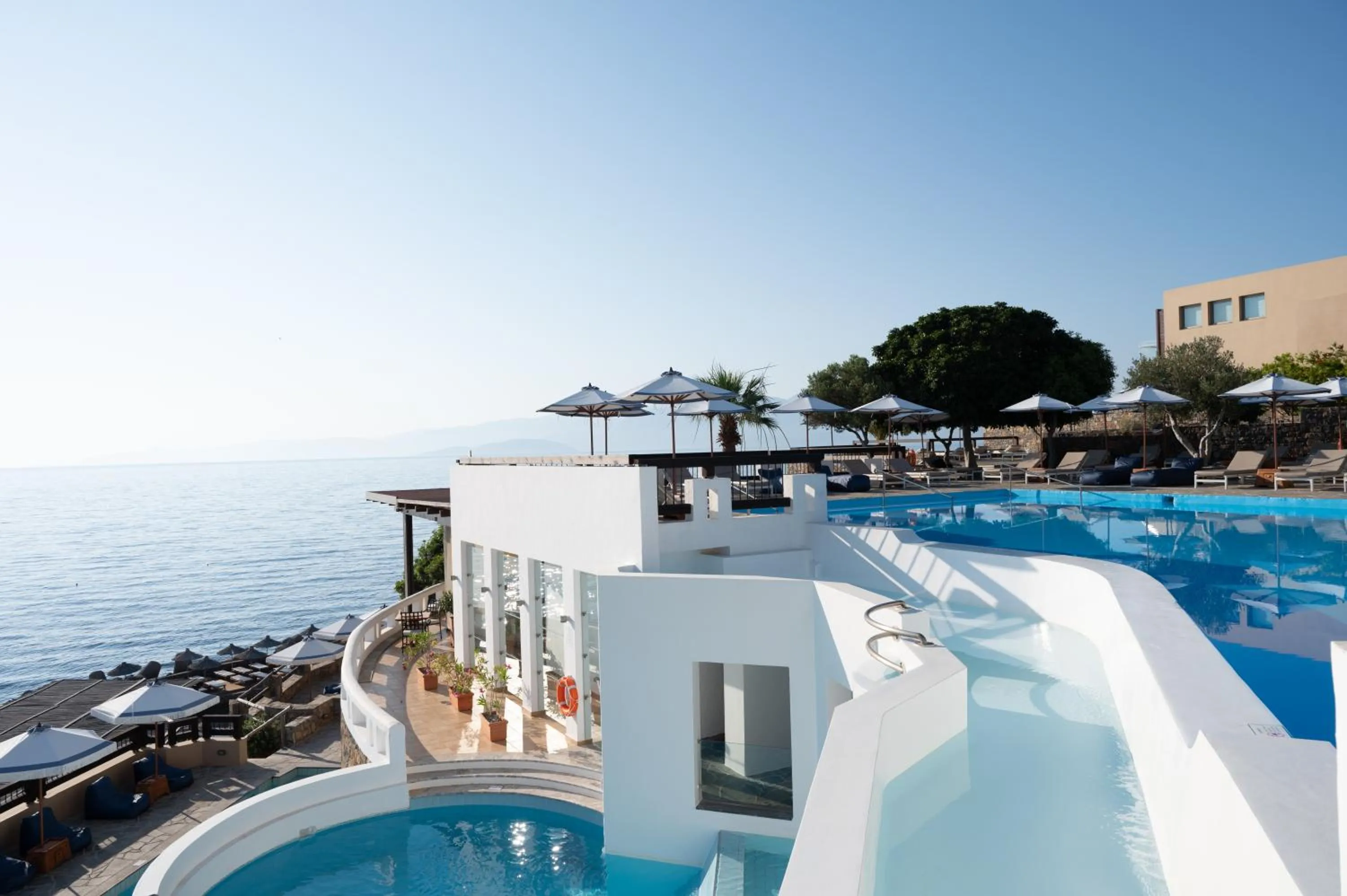 Pool view in Aquila Elounda Village Resort, Suites & Spa