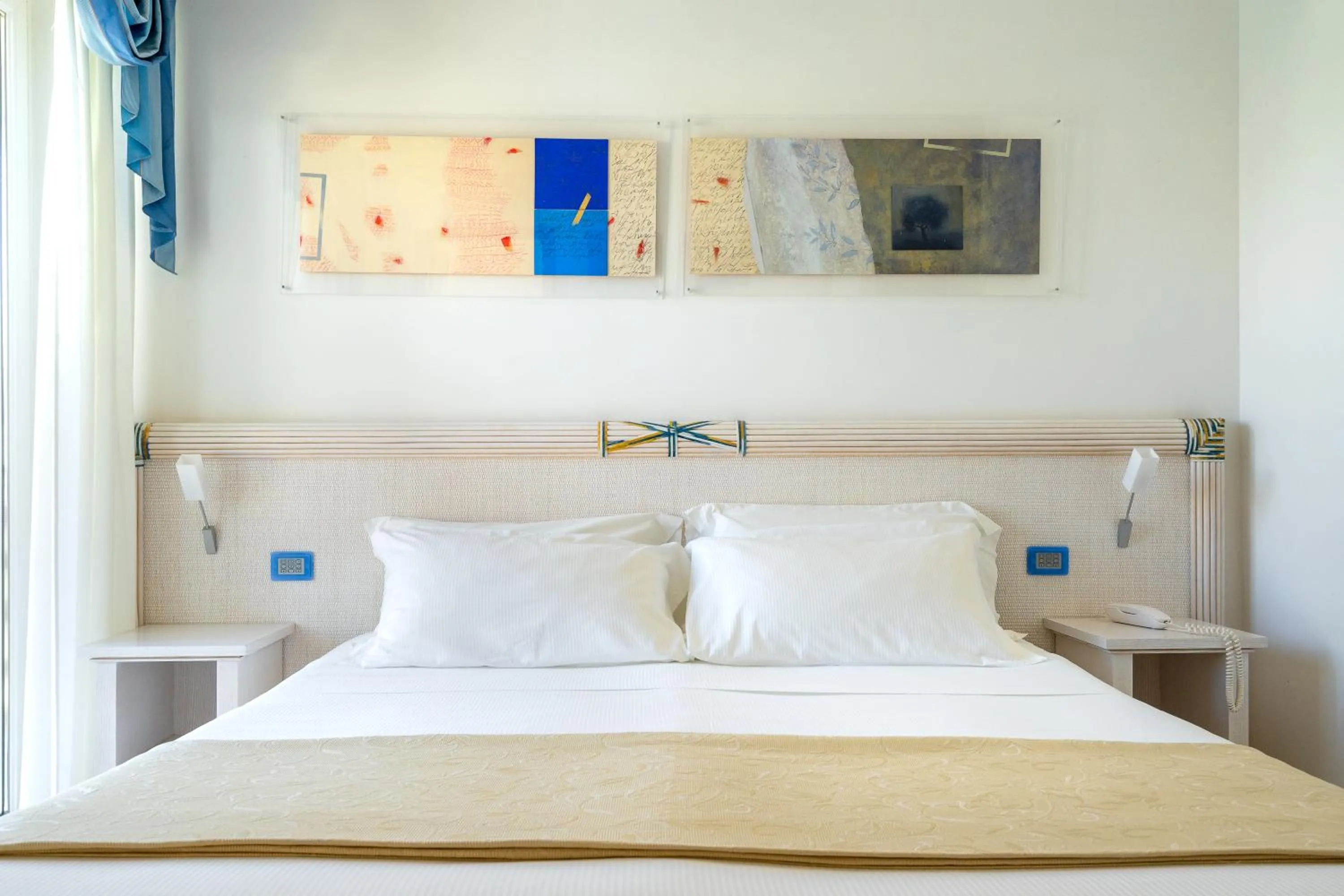 Bed in Elaia Garden Hotel