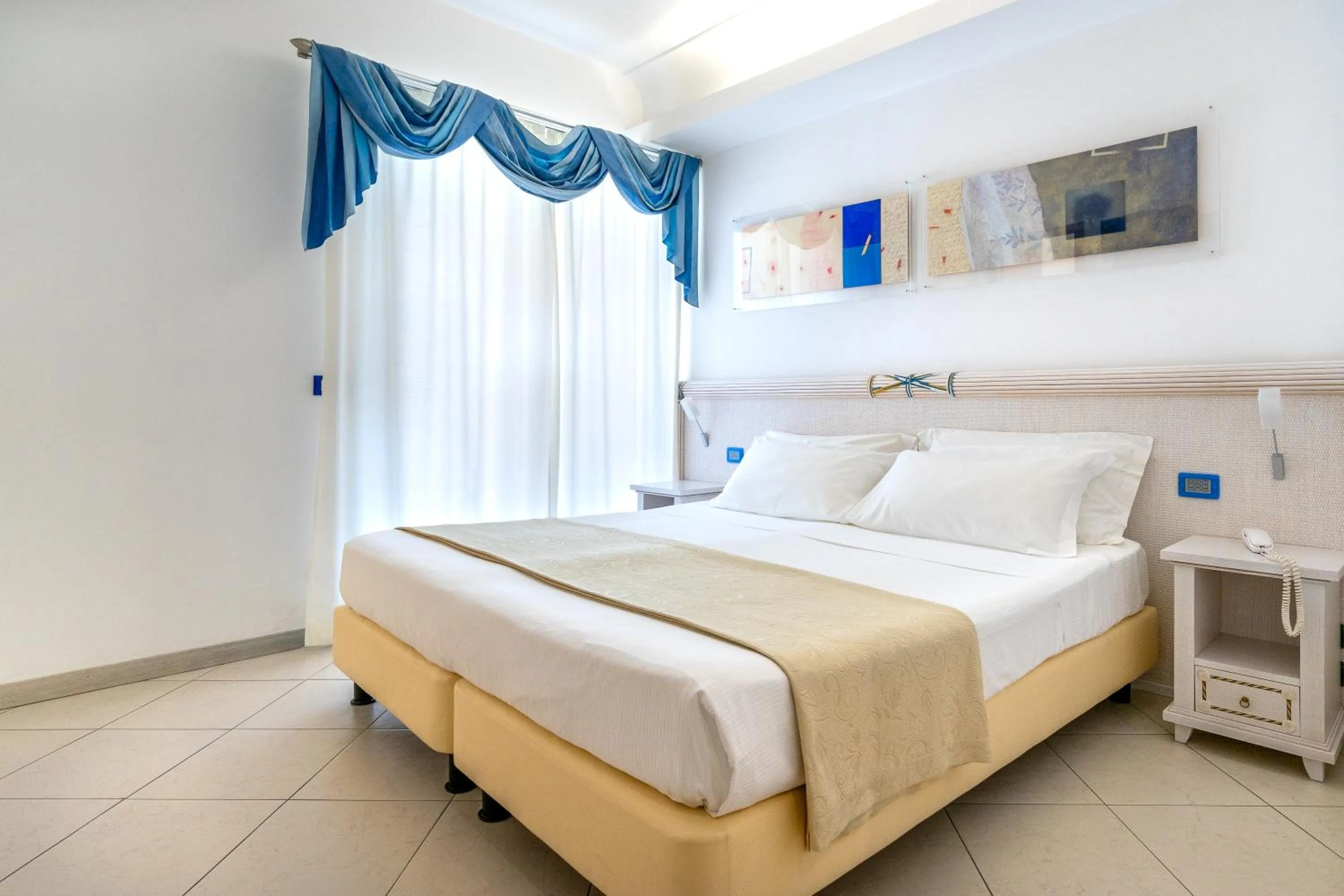 Bed in Elaia Garden Hotel