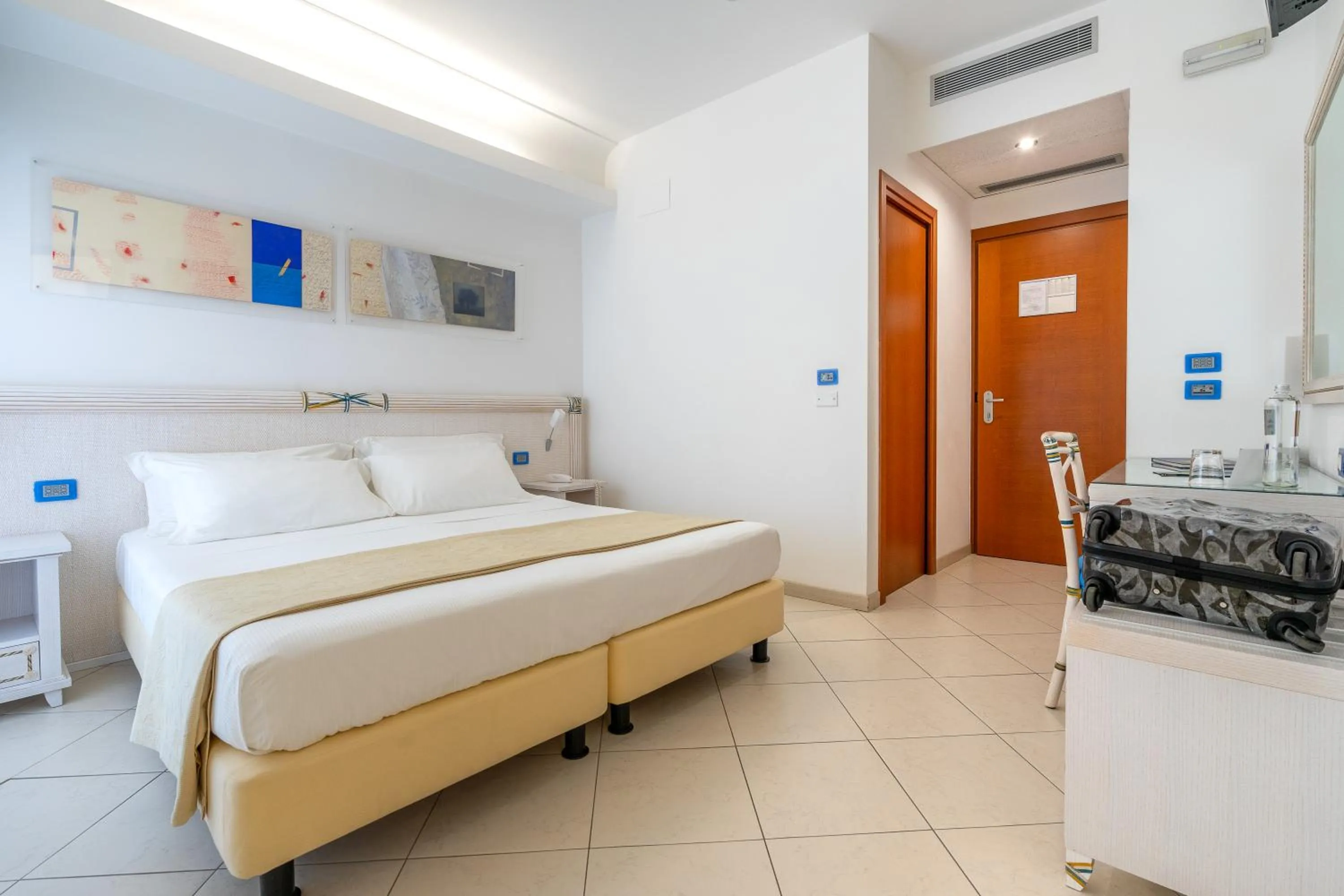 Bed in Elaia Garden Hotel