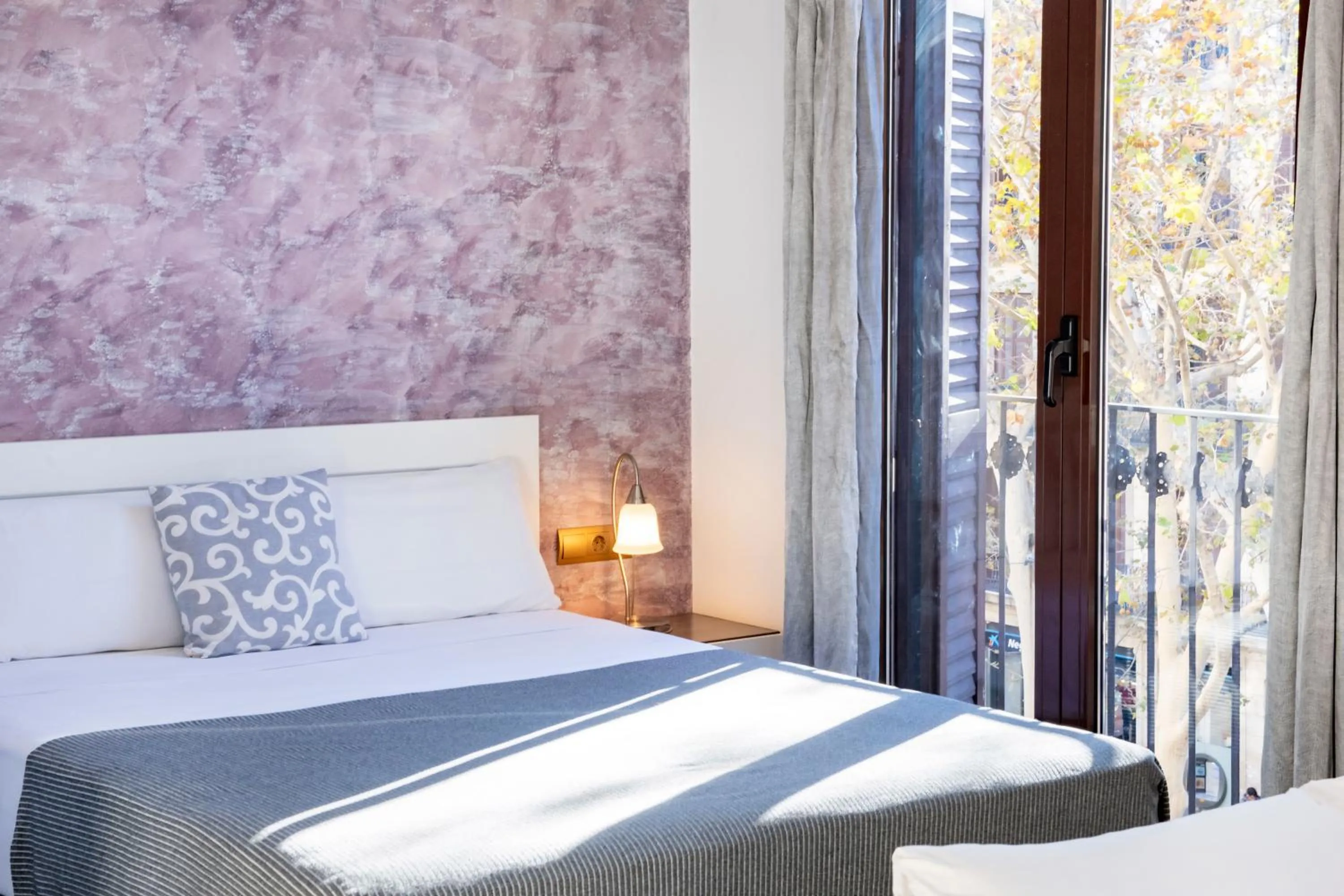 Bed in Aparthotel Rambla108