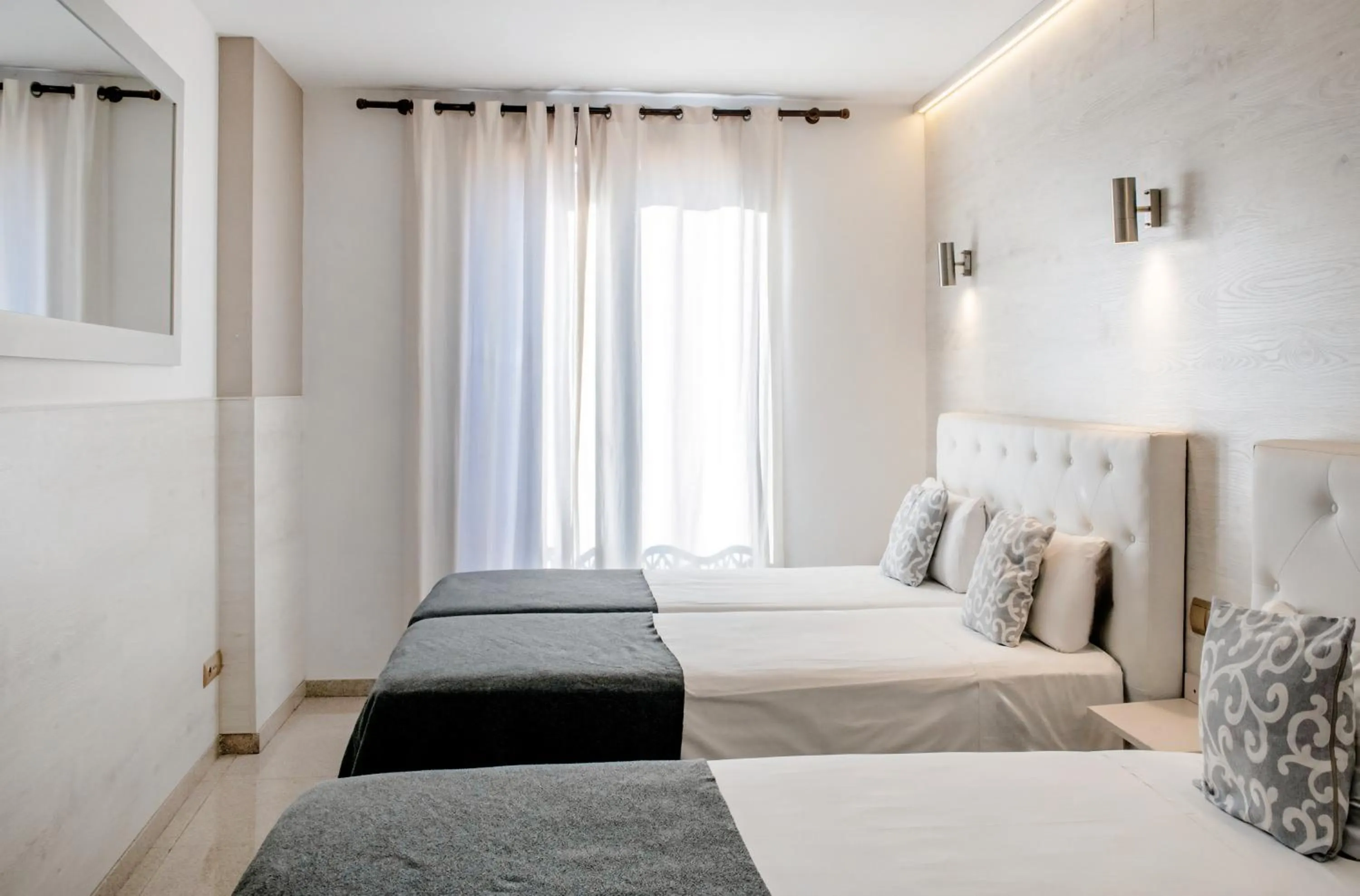 Bed in Aparthotel Rambla108