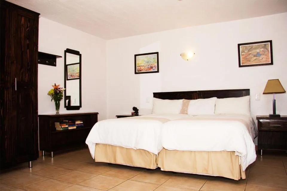 Bed in Stephan's Guest House