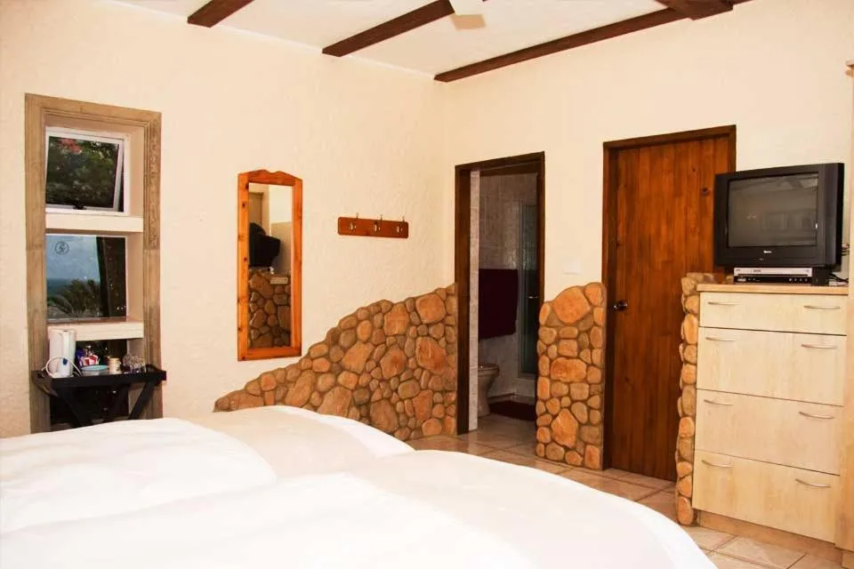 Bed in Stephan's Guest House