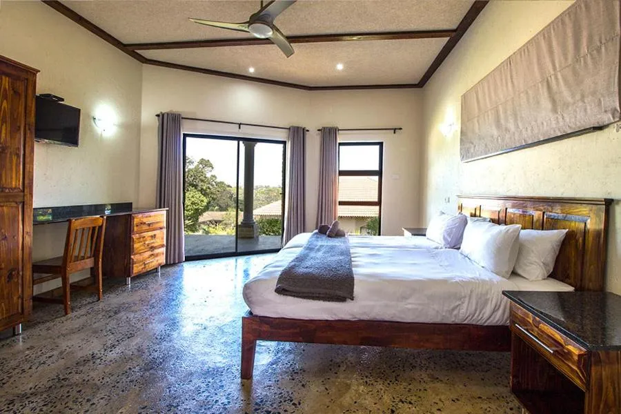 Bed in Stephan's Guest House