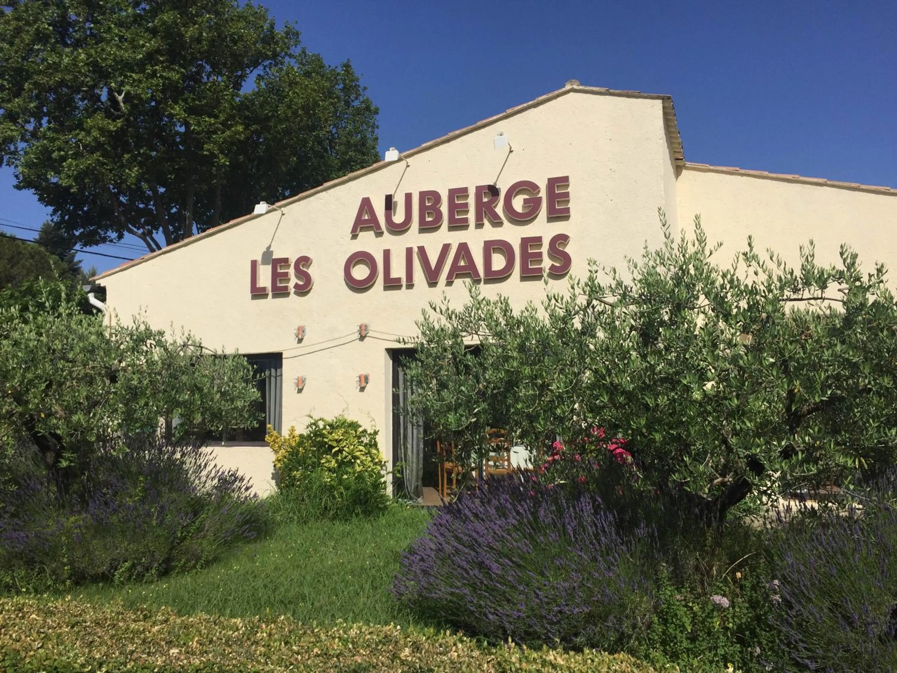 Property logo or sign in Auberge Les Olivades