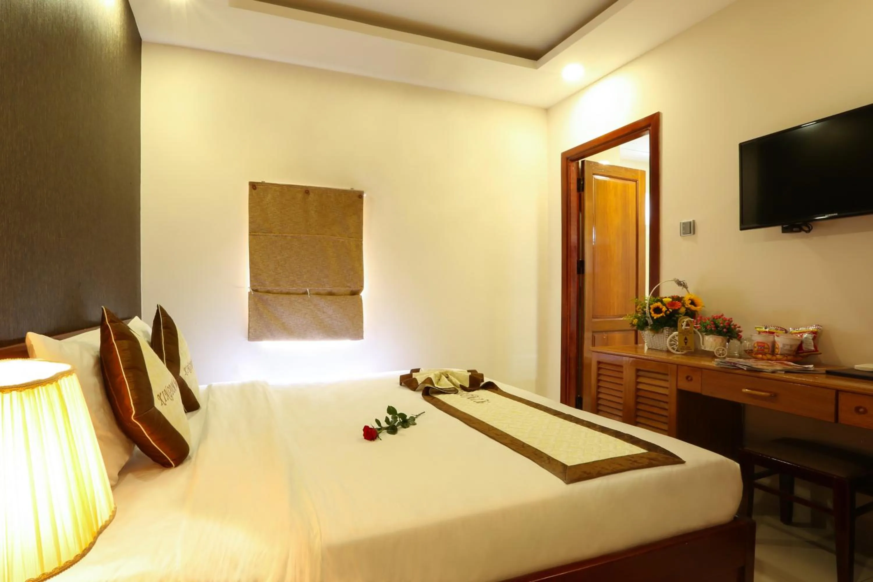 Bed in Kingdom Danang Hotel