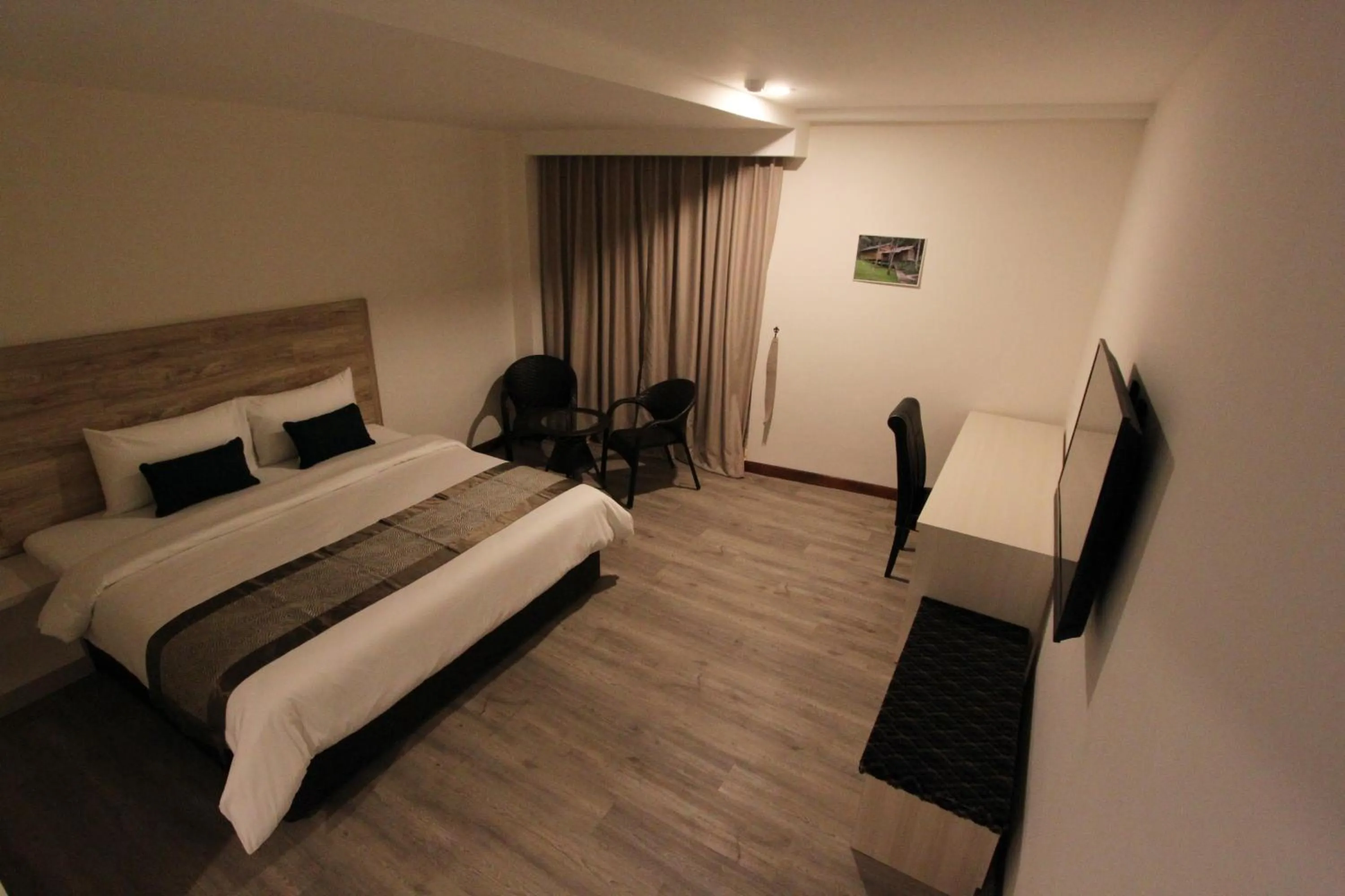 Bed in Molek Garden Hotel