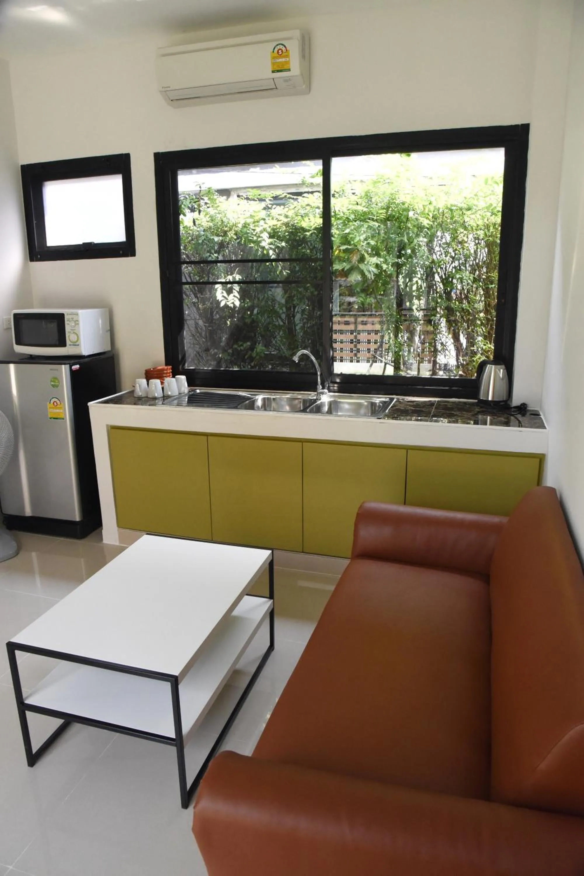 Kitchen or kitchenette in Fairtex Residence Pattaya