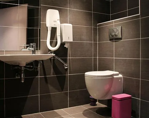 Bathroom in Oops! Latin quarter by Hiphophostels