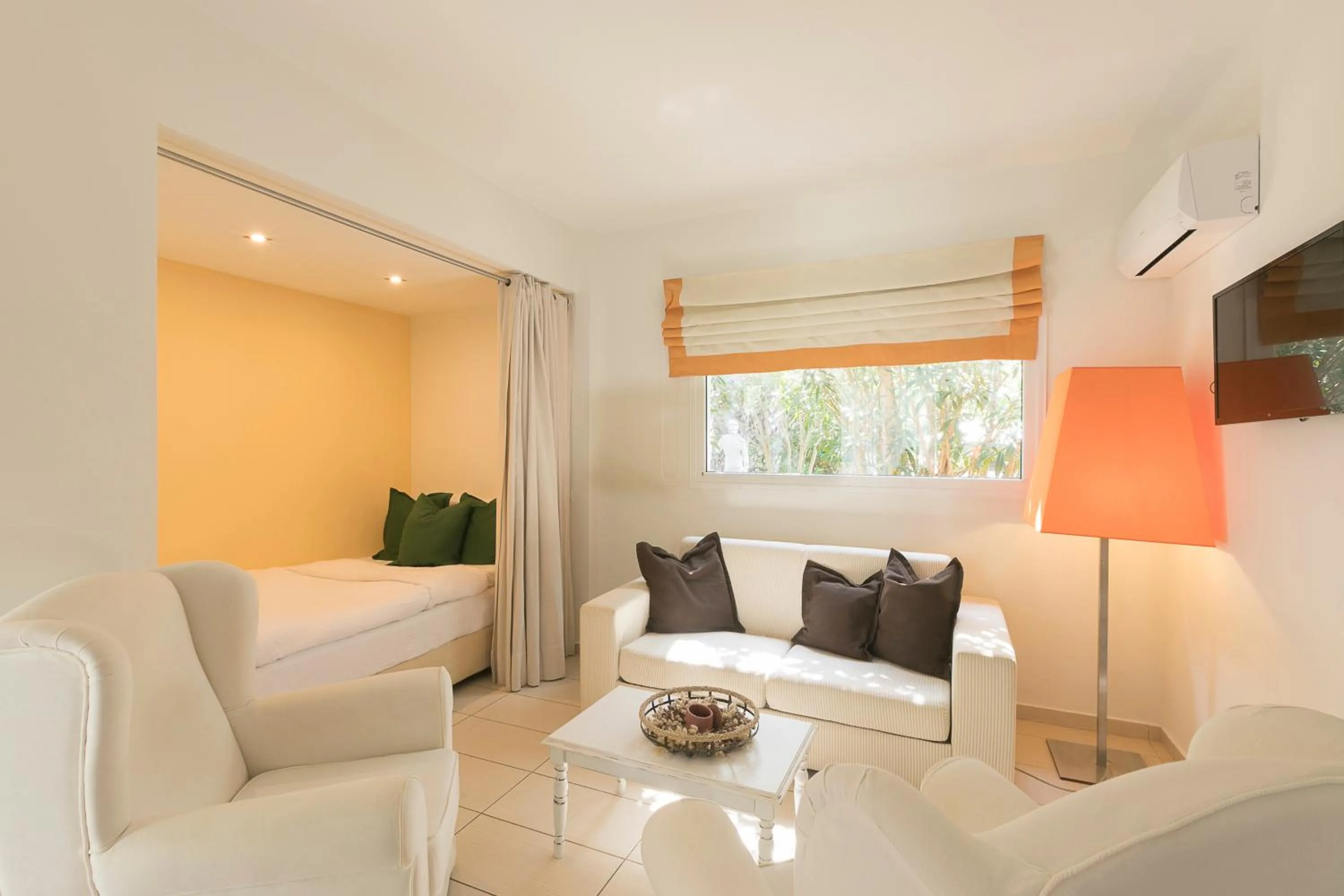 Living room, Bed in Mandraki Village Boutique Hotel