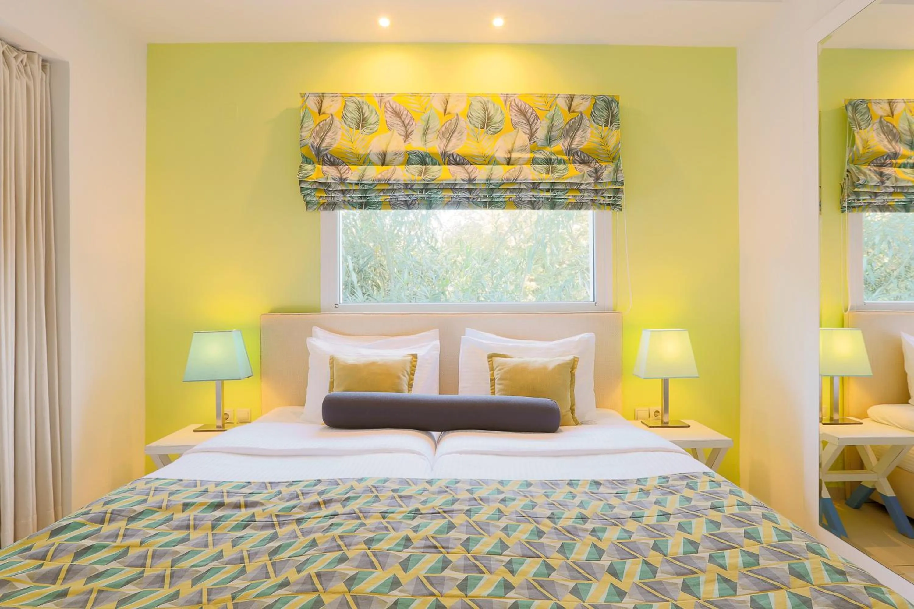 Bed in Mandraki Village Boutique Hotel