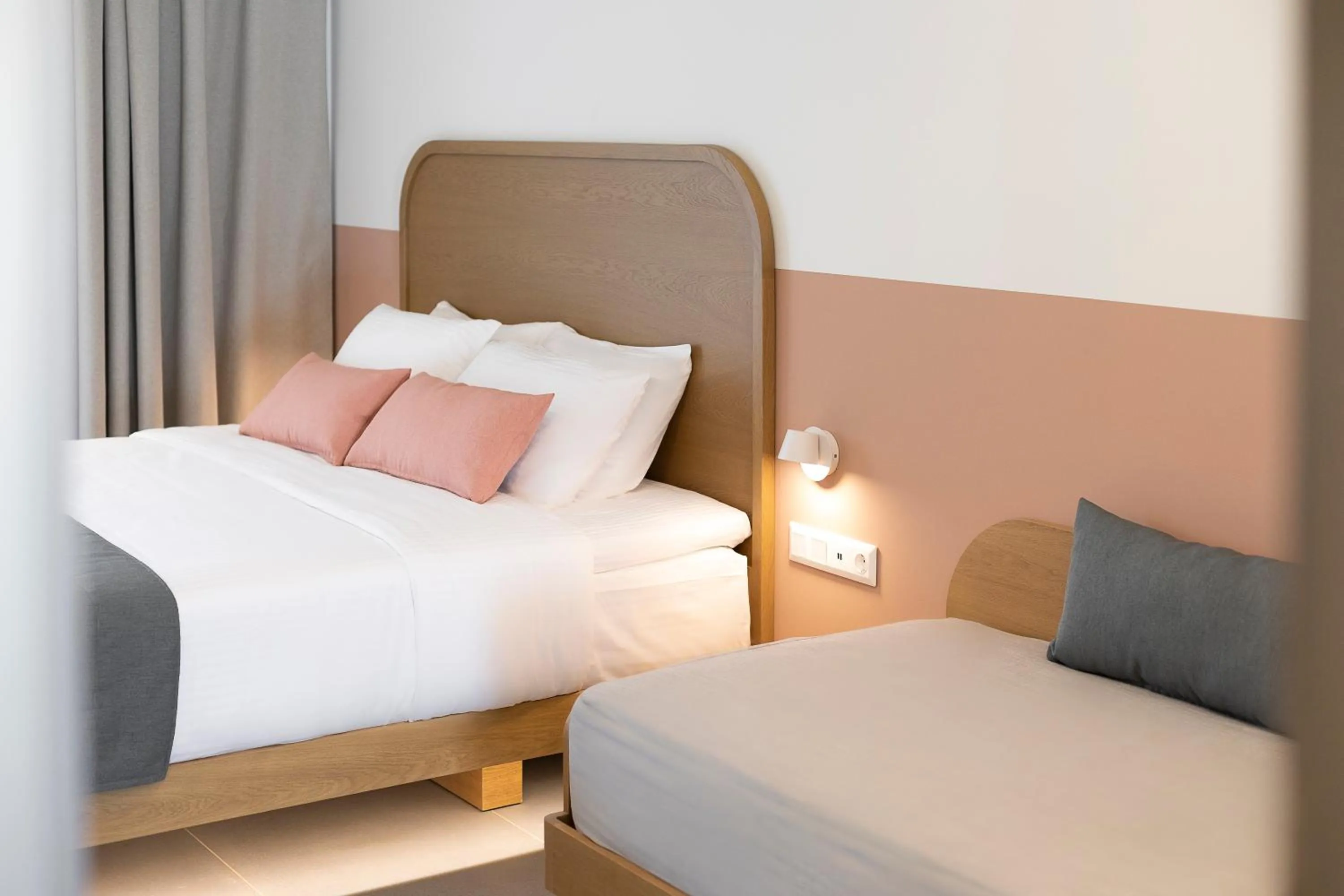 Bed in Mandraki Village Boutique Hotel