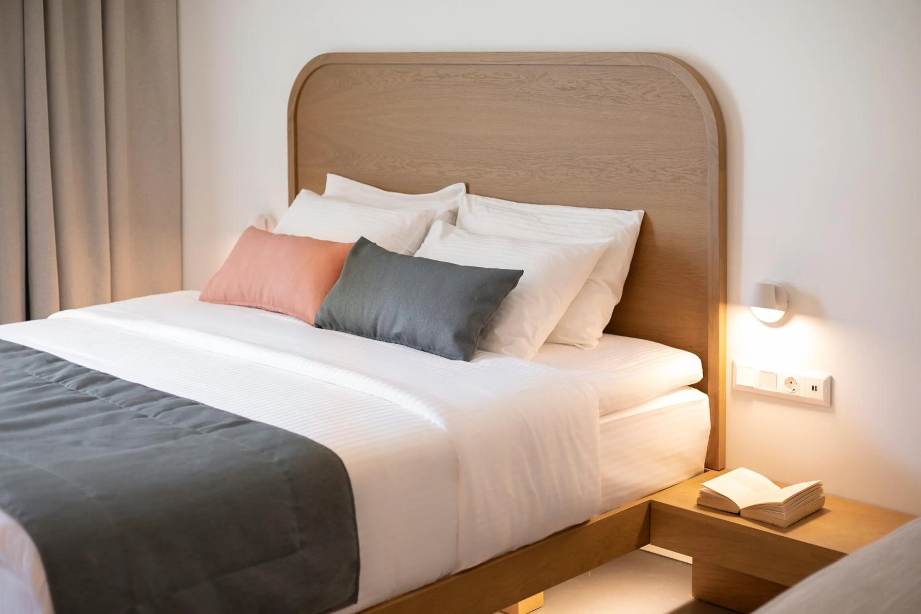 Bed in Mandraki Village Boutique Hotel