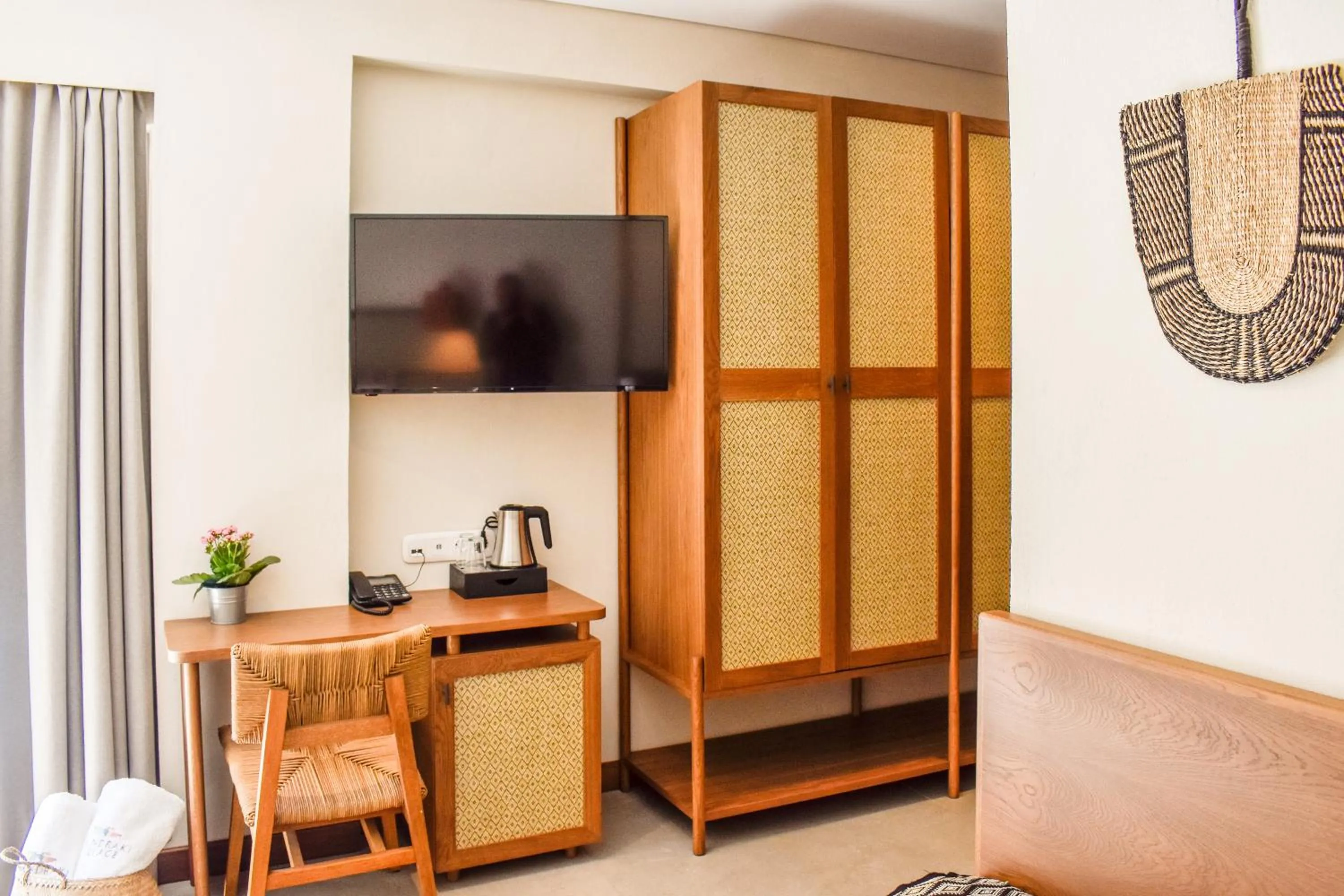 Bedroom in Mandraki Village Boutique Hotel