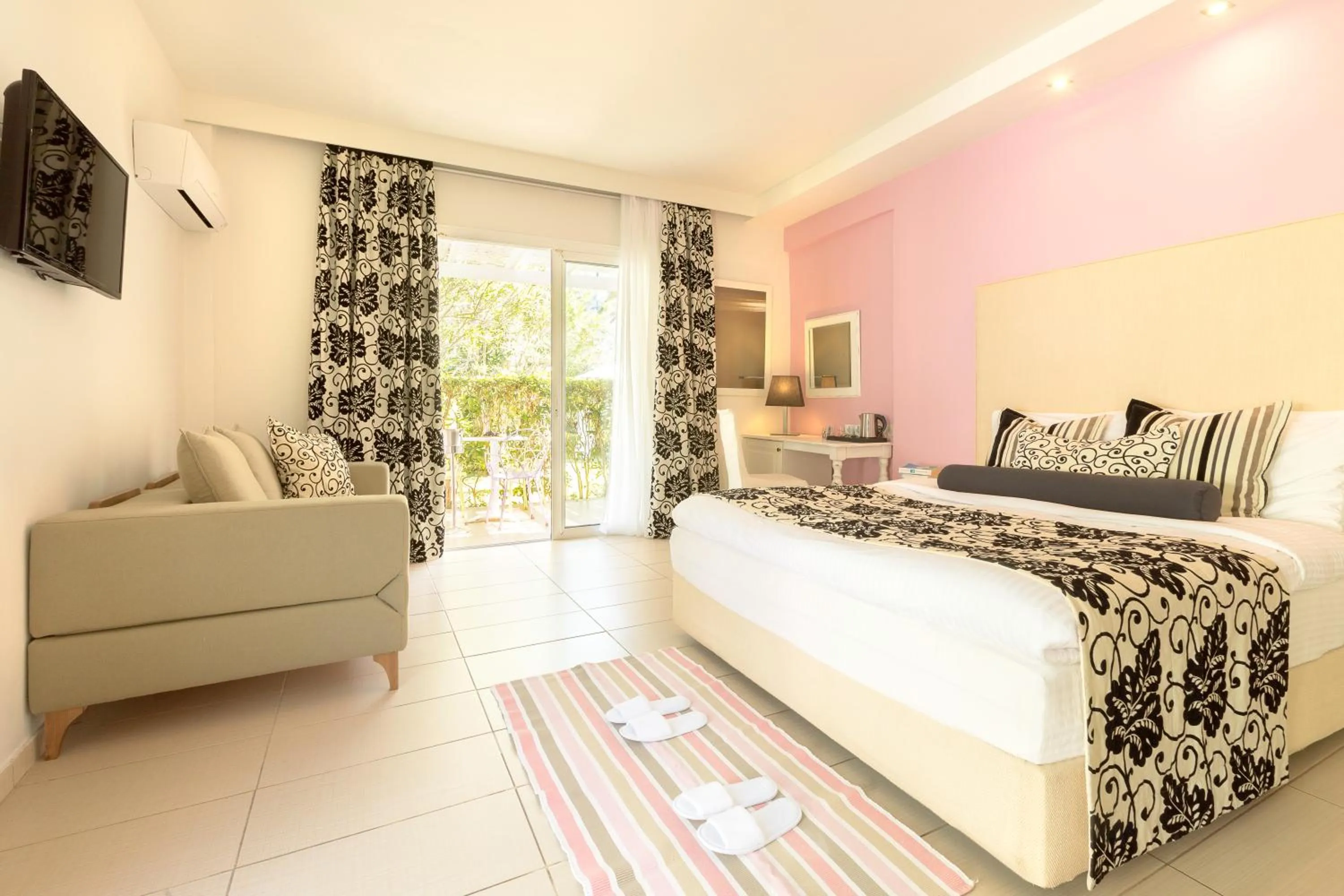 Photo of the whole room, Bed in Mandraki Village Boutique Hotel