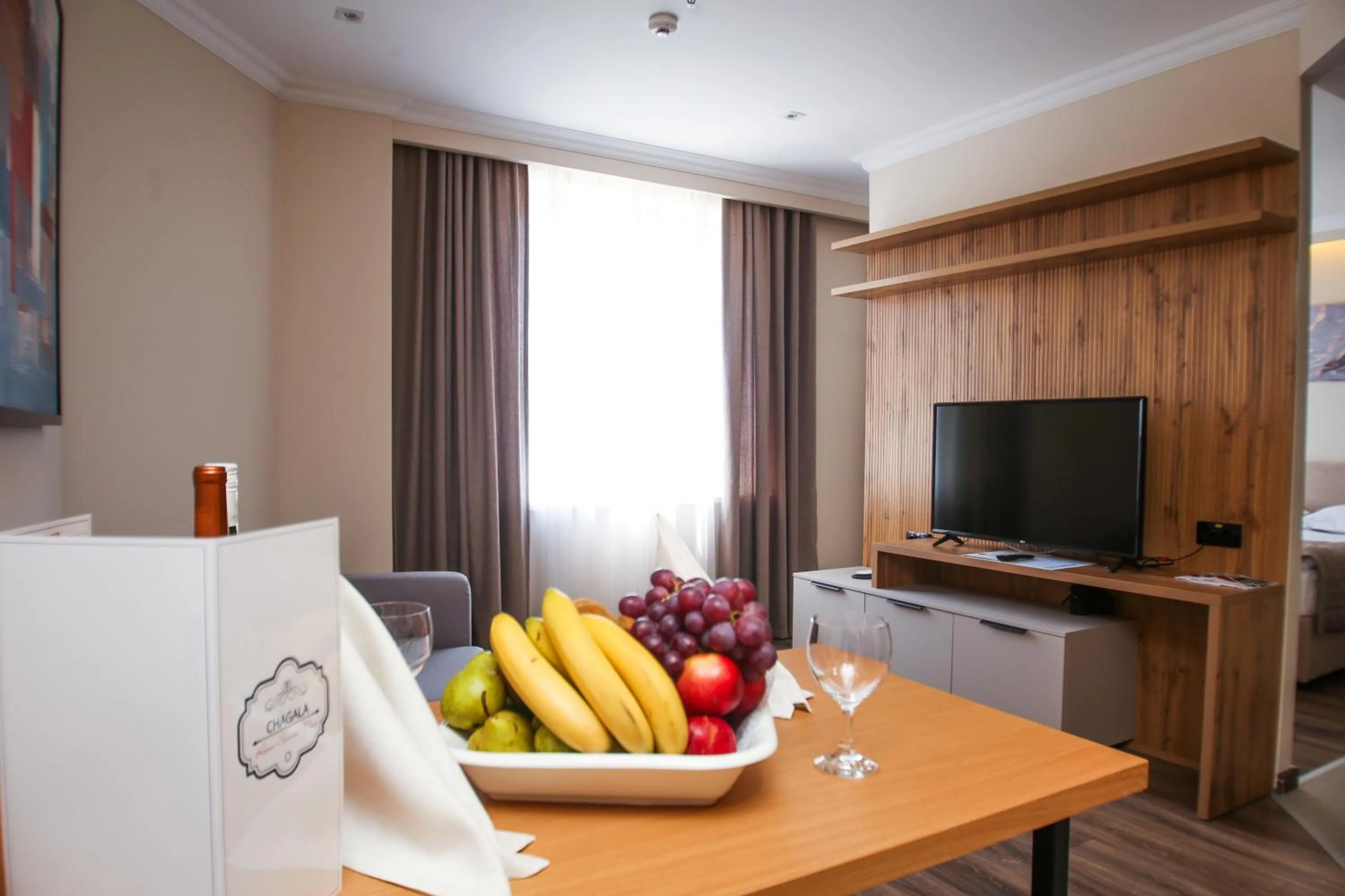 Communal lounge/ TV room in Chagala Residence Atyrau