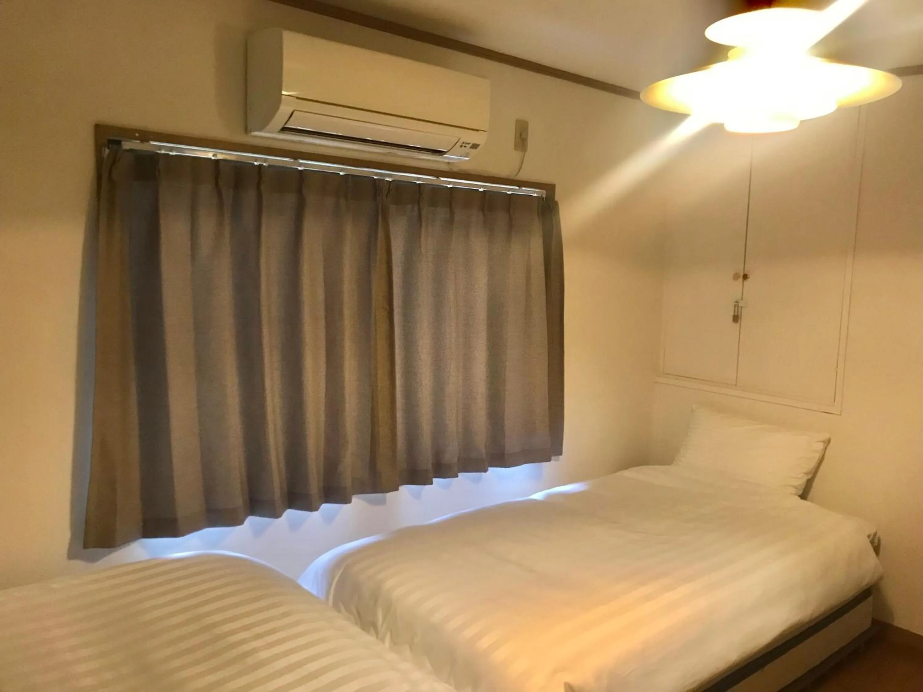 Bed in NOW TRAVEL ShinOsaka