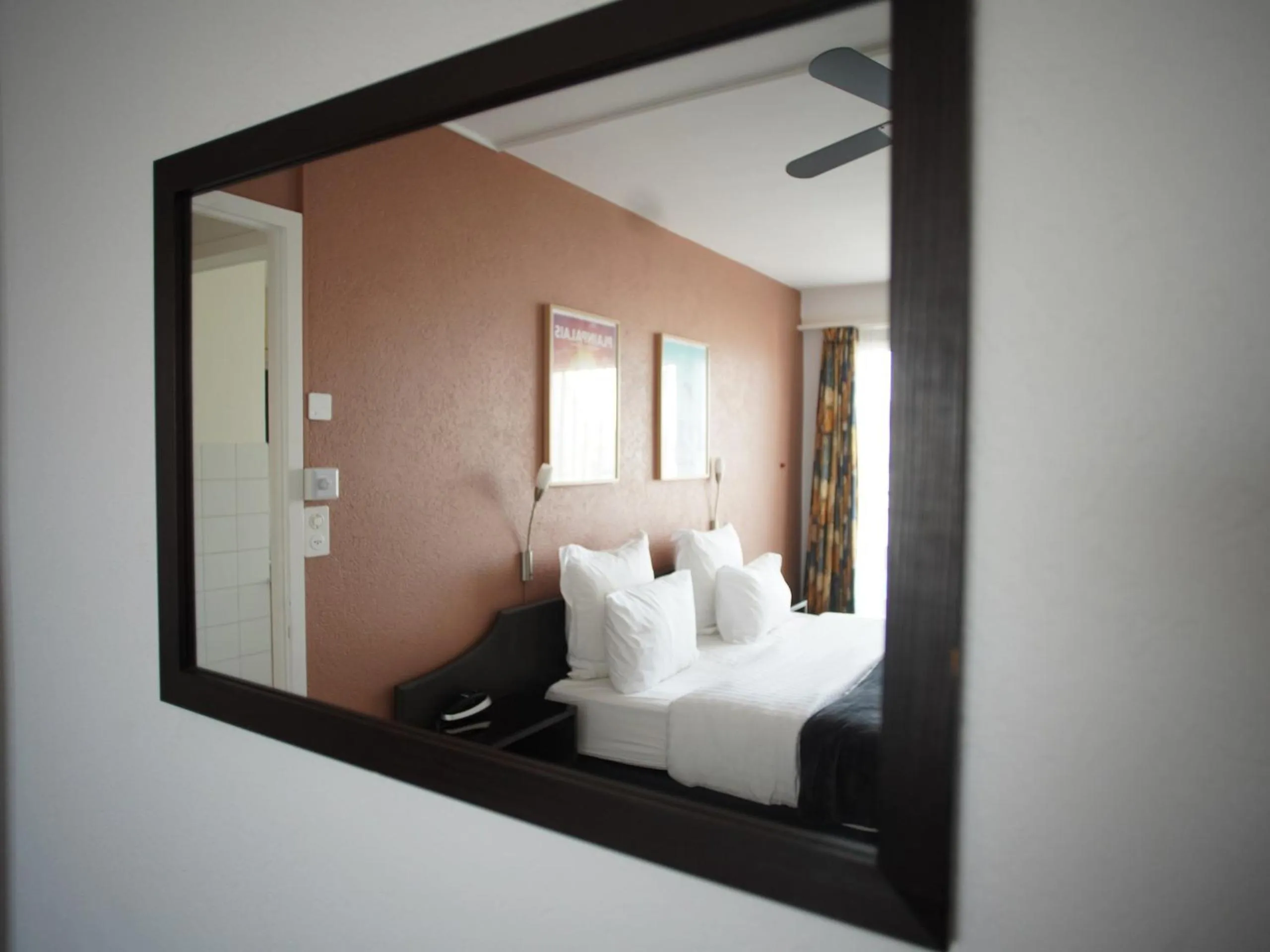 Bed in Primadom Aparthotel