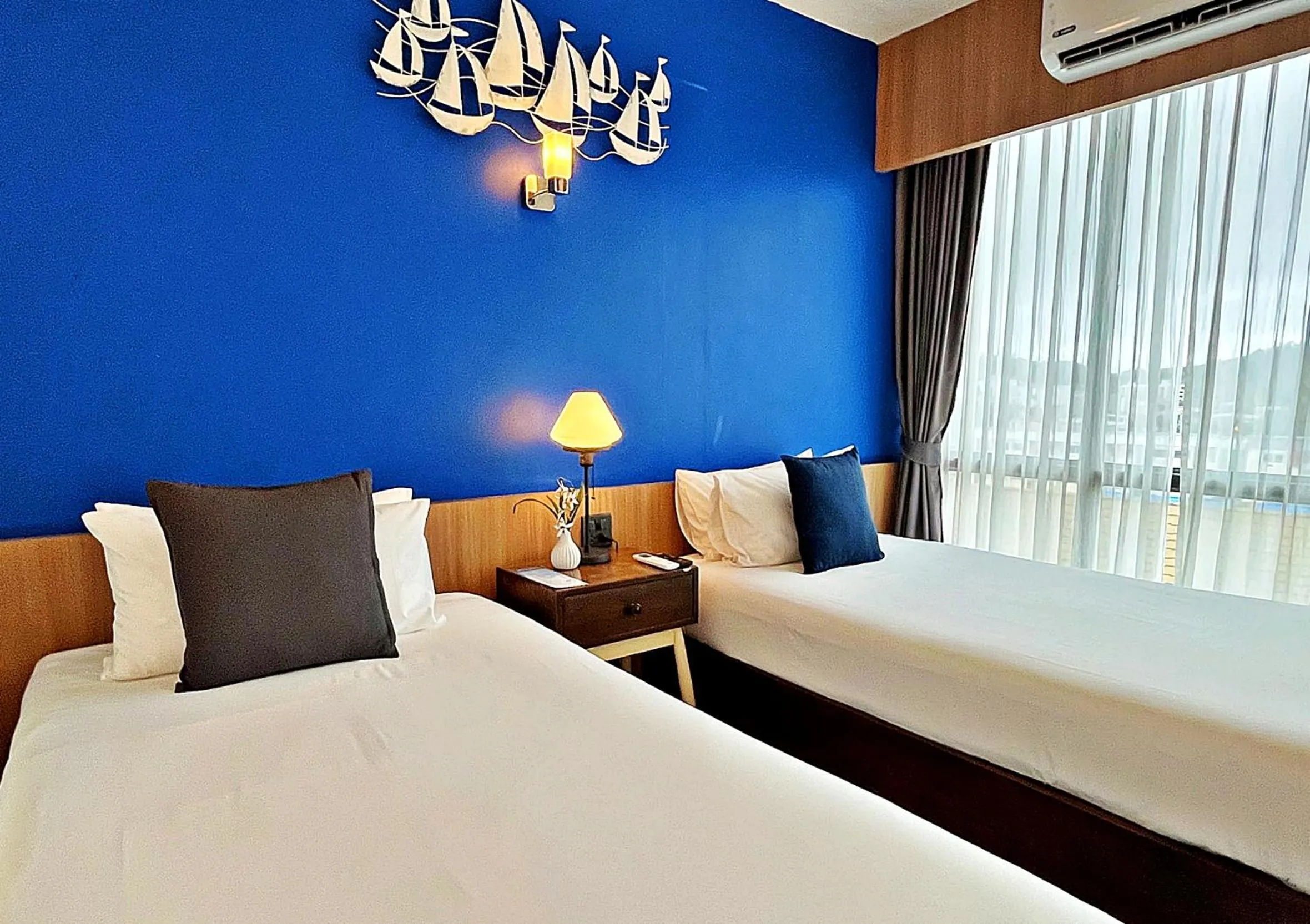 Bed in The Sixteenth Naiyang Beach Hotel- Free Schedule Airport Shuttle