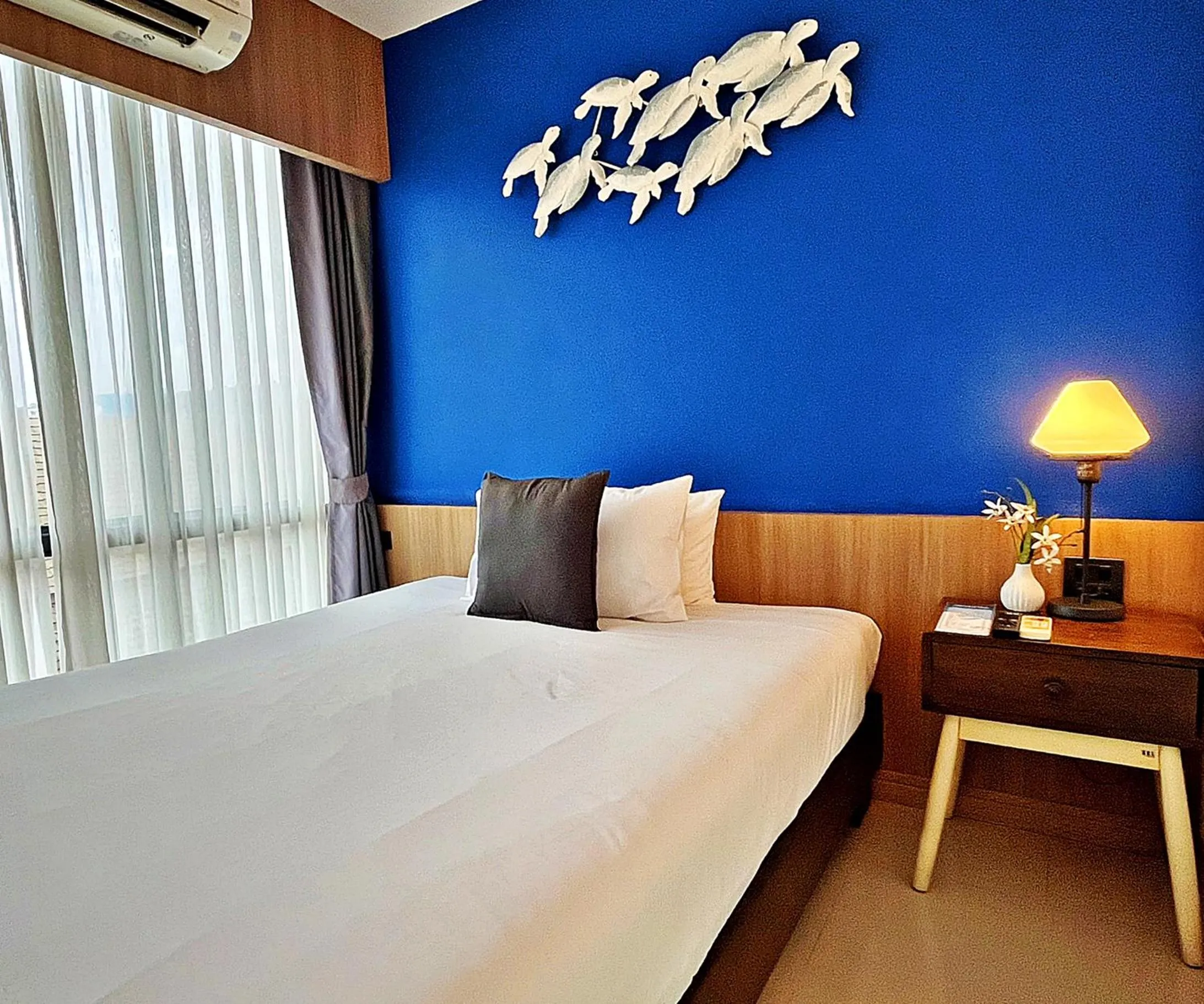 Bed in The Sixteenth Naiyang Beach Hotel- Free Schedule Airport Shuttle