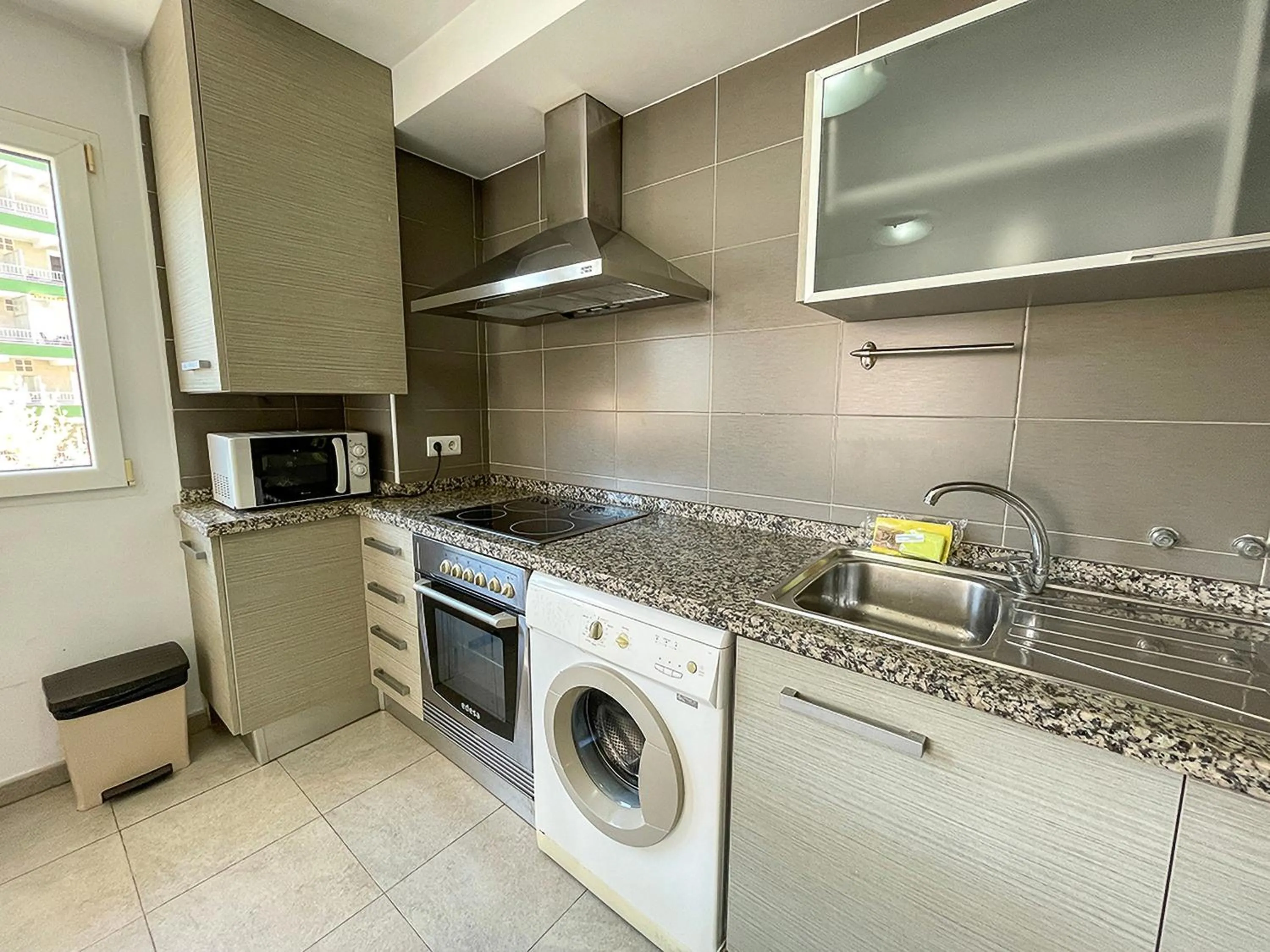 Kitchen or kitchenette in Apartamentos Gandía Centro 3000