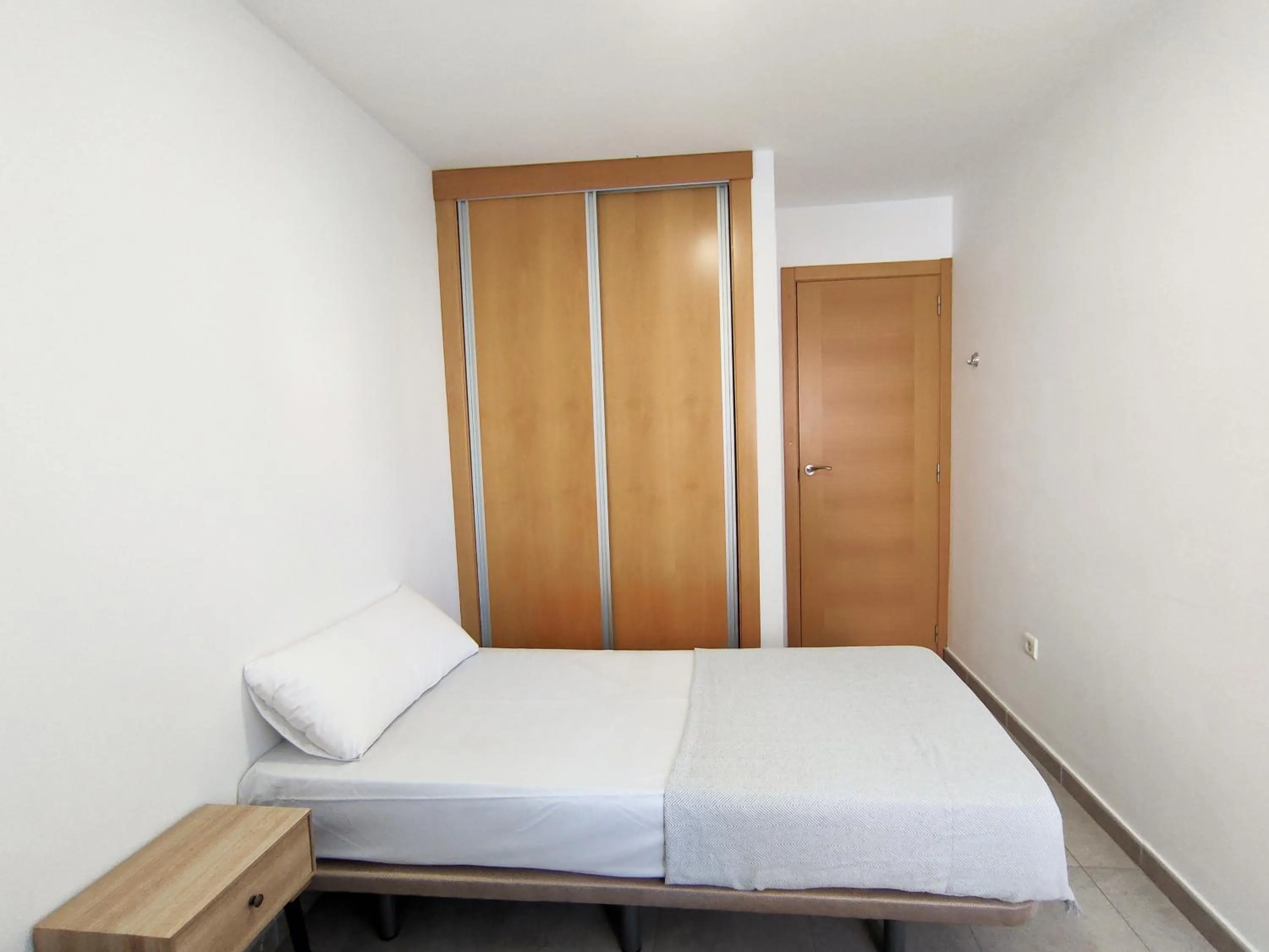 Bedroom, Bed in Apartamentos Gandía Centro 3000