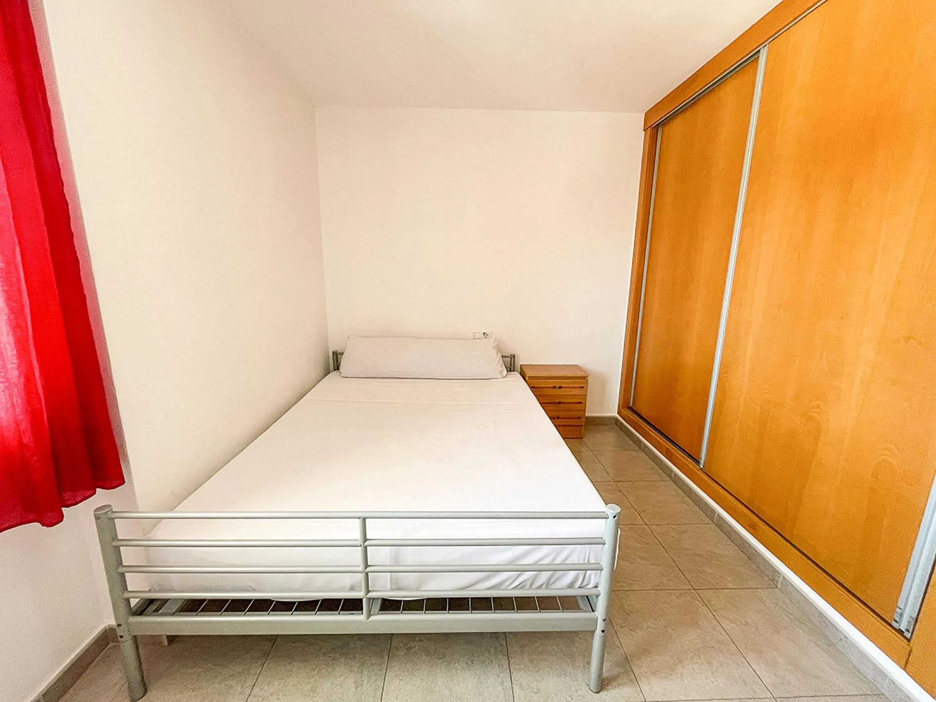 Bedroom, Bed in Apartamentos Gandía Centro 3000