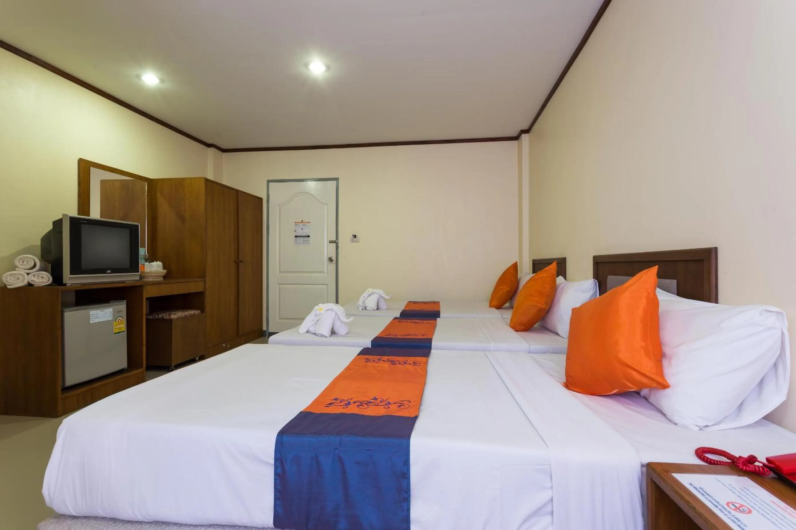 Bed in KYP Khunyuw Place Hotel โรงแรมเควายพี ขุนยูวเพลส ฝาง