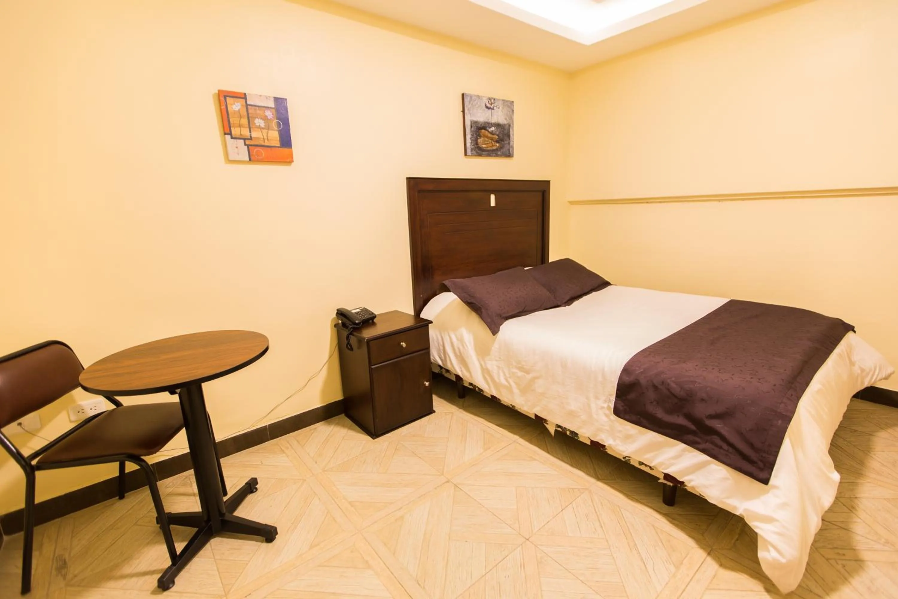 Bed in Hotel Saint Thomas