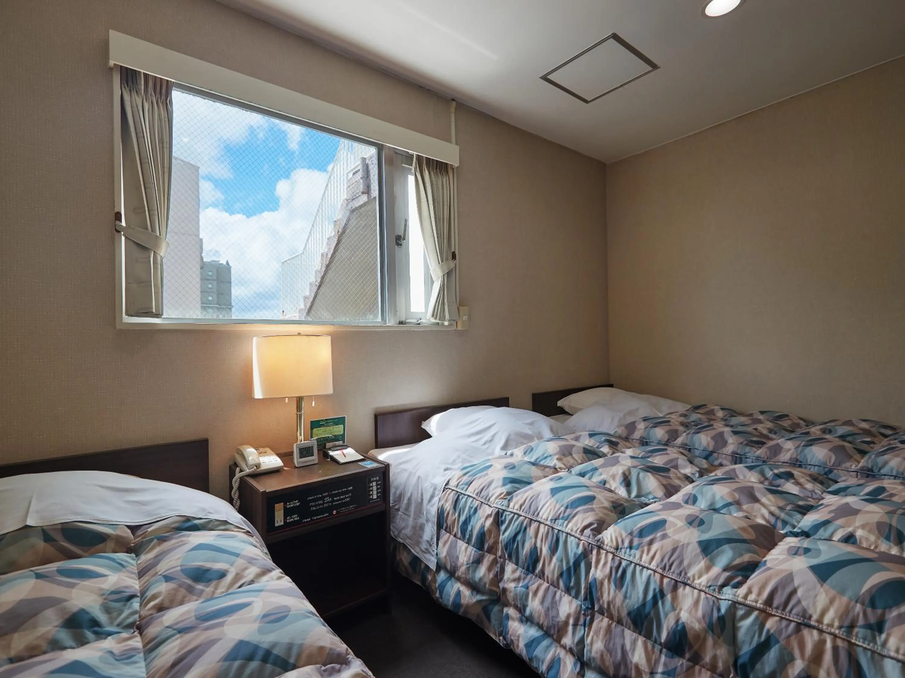 Photo of the whole room, Bed in Hotel Yamanouchi