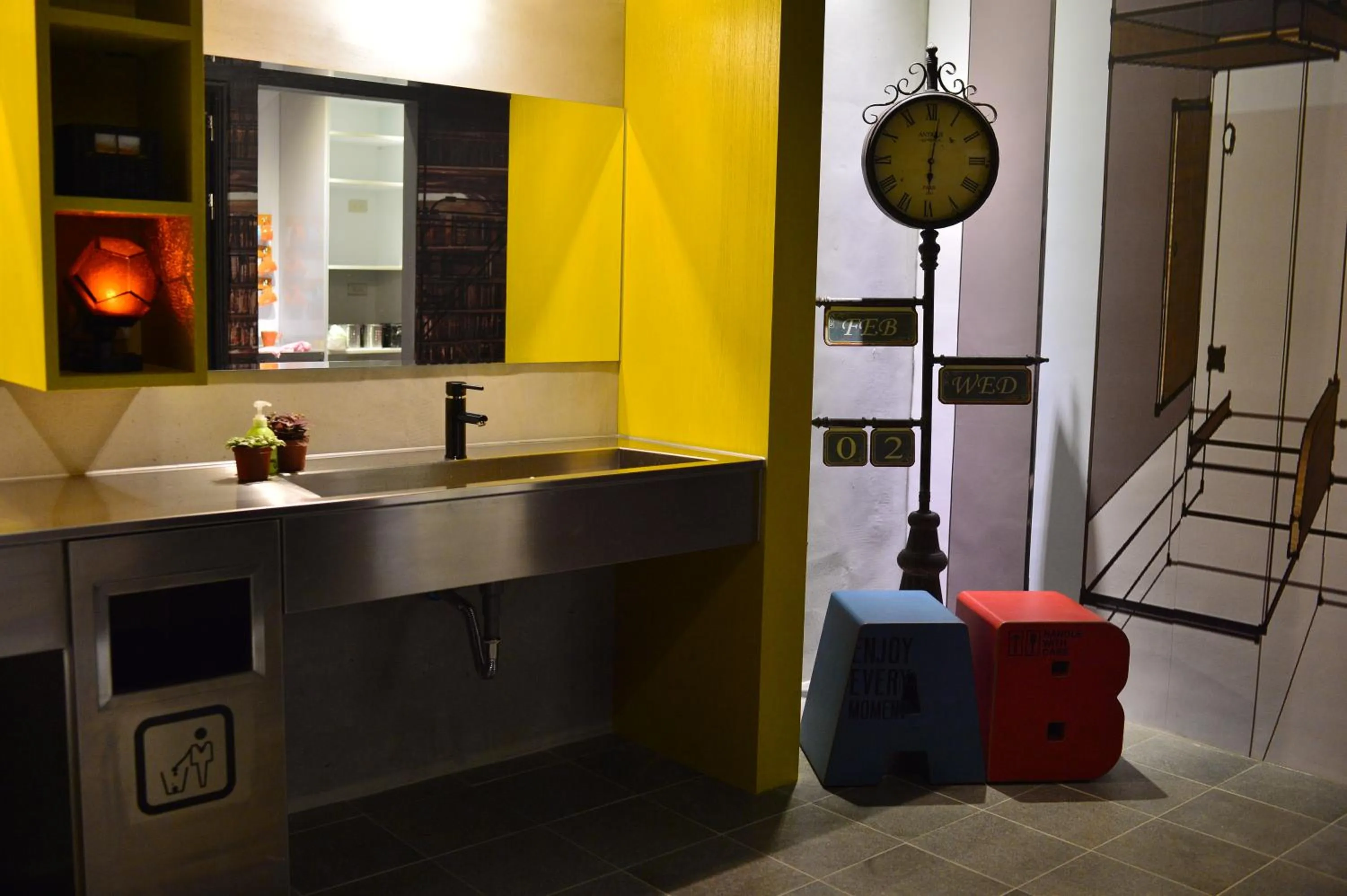 Communal lounge/ TV room in Just Walk Backpacker Hostel