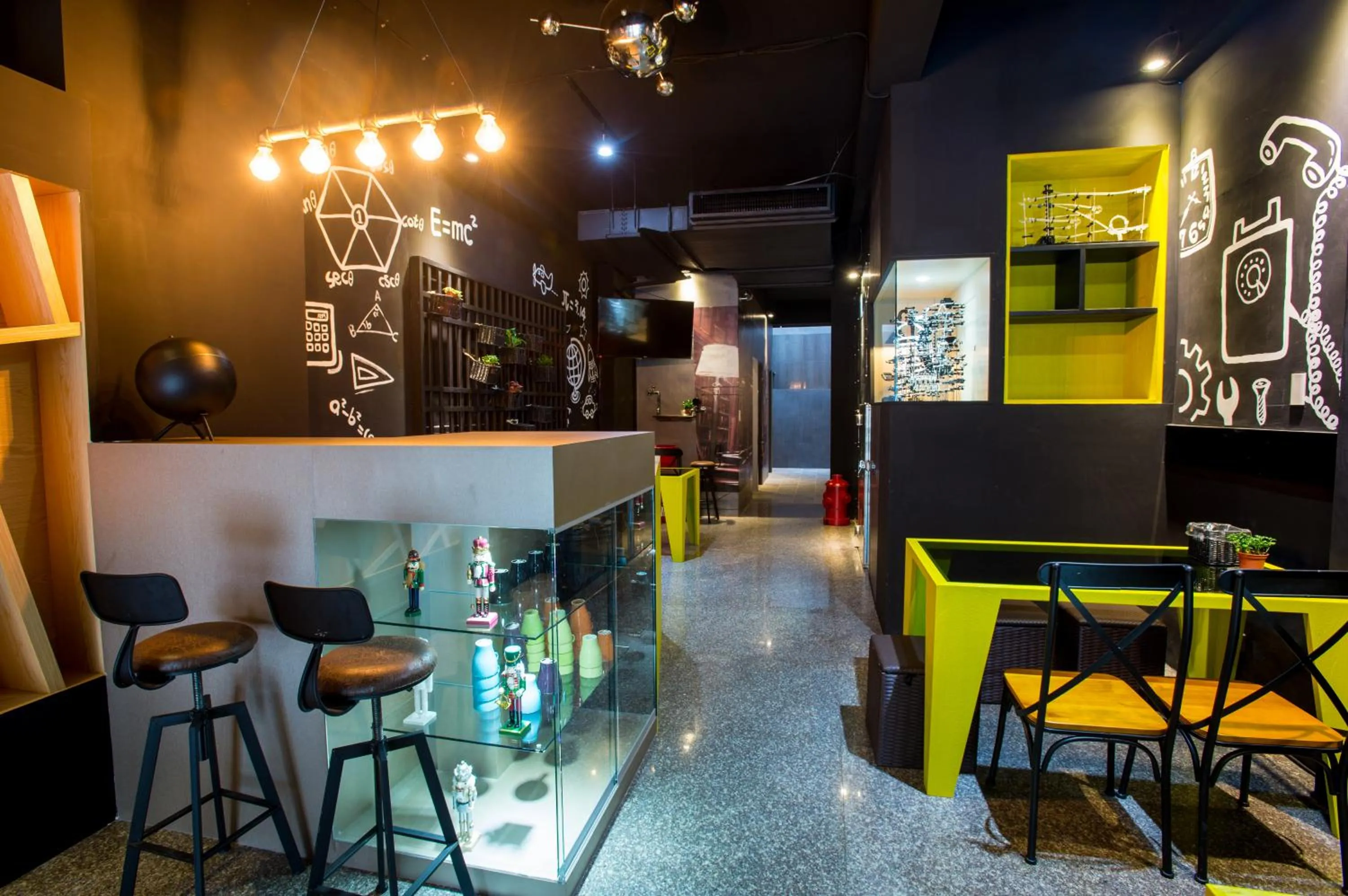 Communal lounge/ TV room in Just Walk Backpacker Hostel