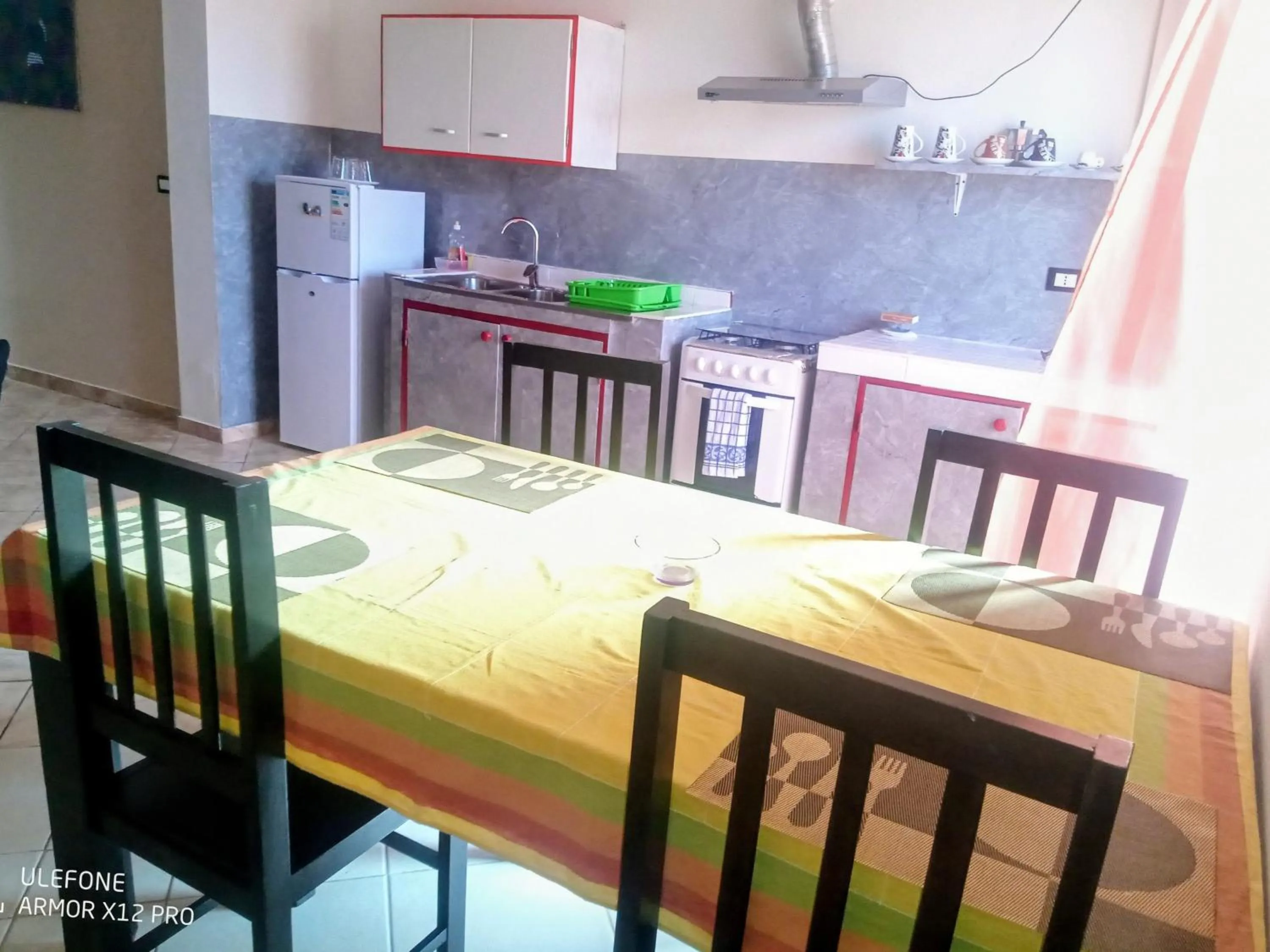 Kitchen or kitchenette in Apart-Hotel Ca Elsa