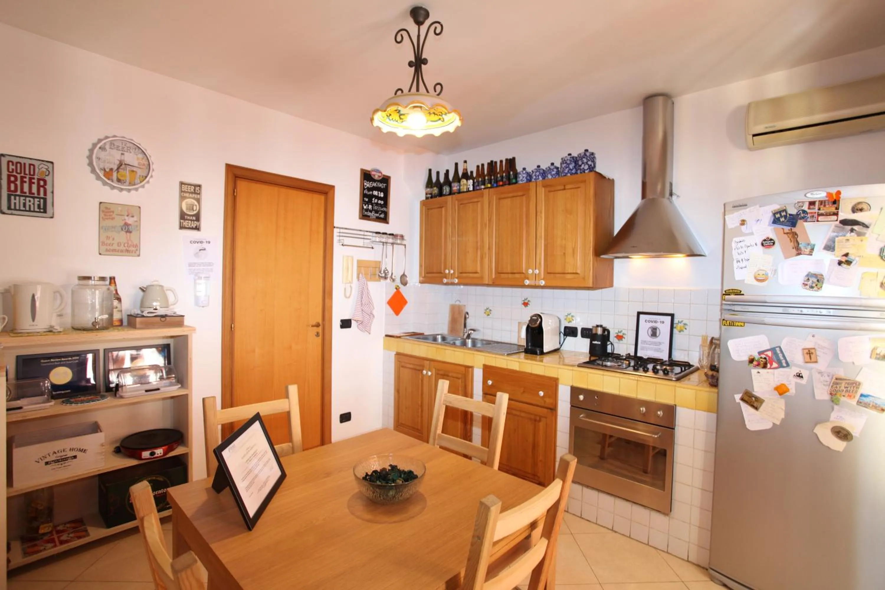 Kitchen or kitchenette in Taormina Bed and BeerCraft