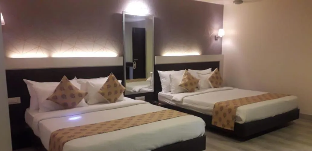 Bed in Hotel Sai Residency