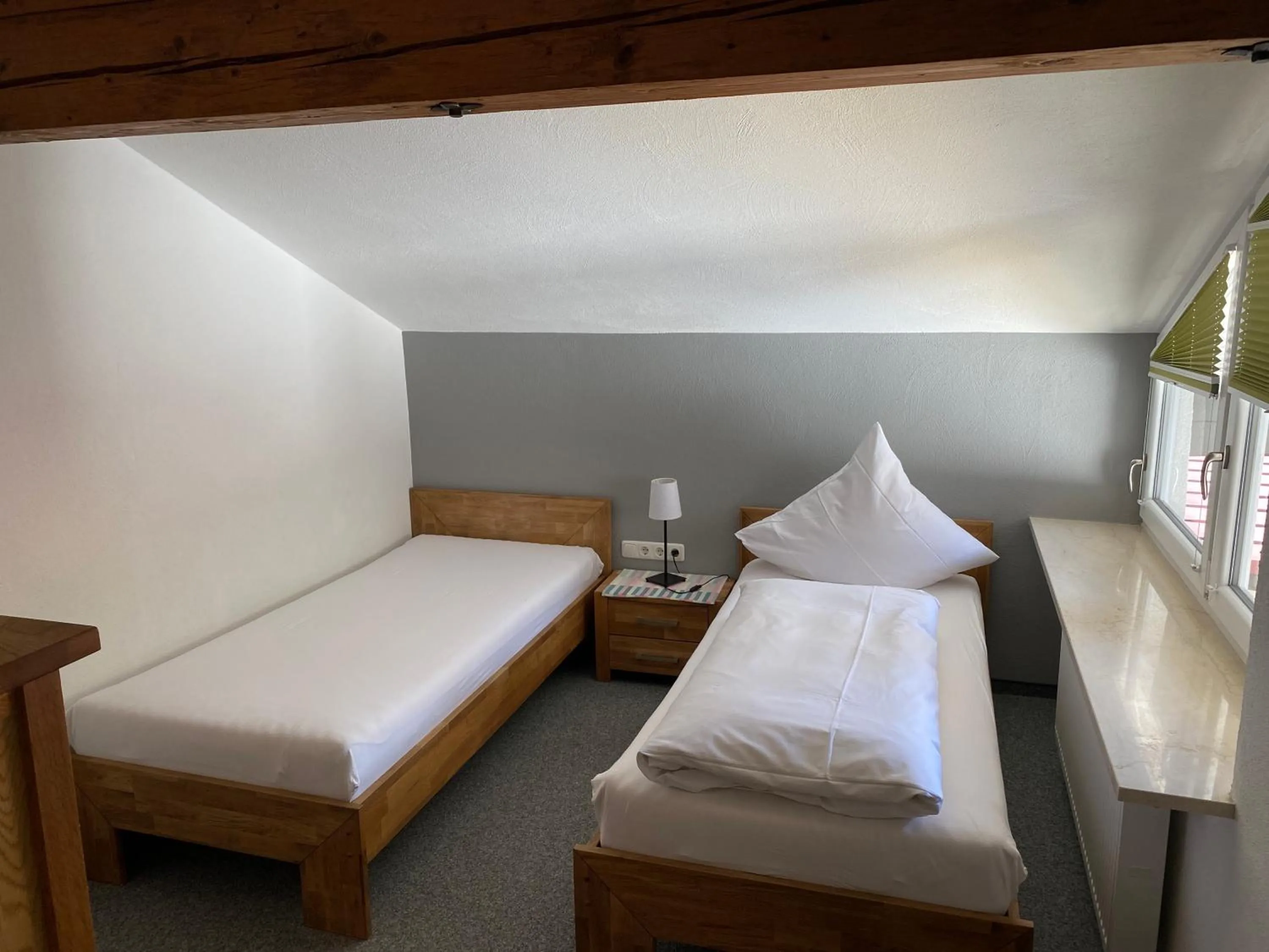Bed in Grüner Hut - DEIN BERGHOTEL